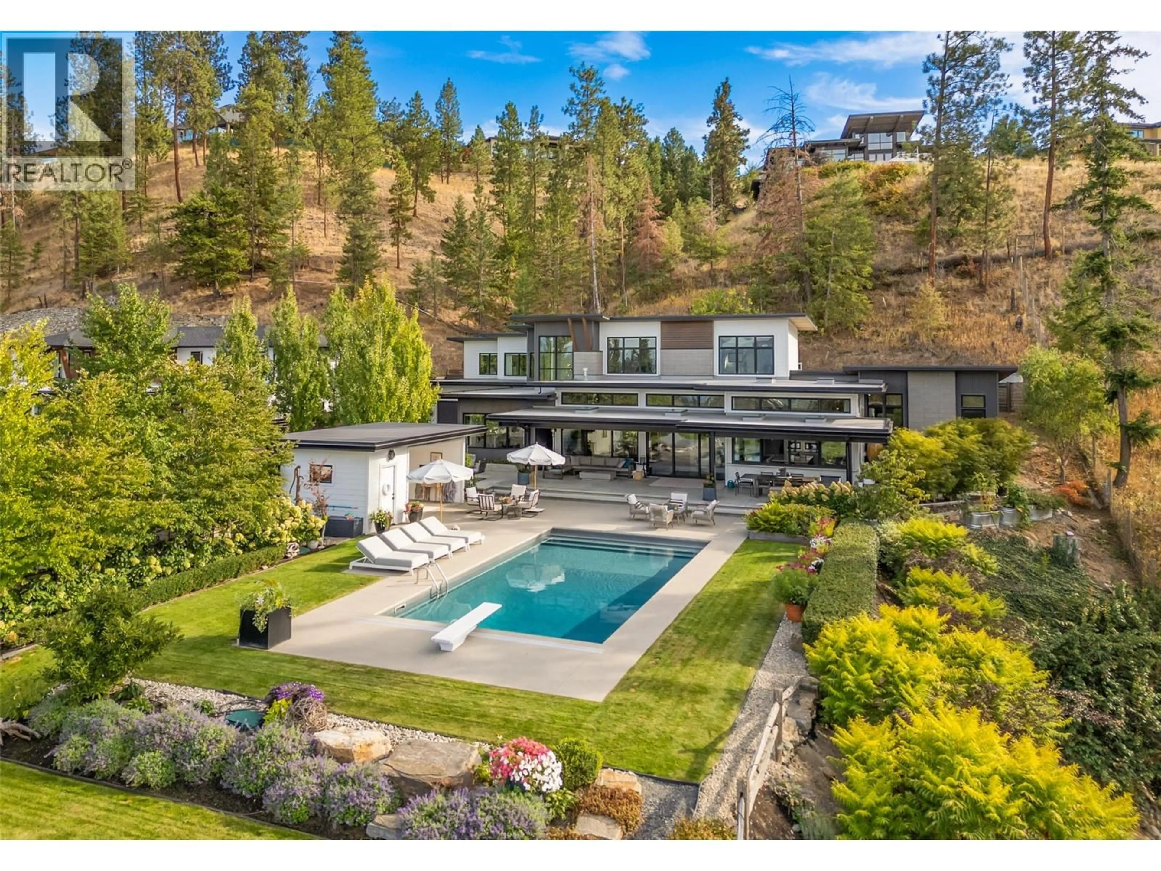 A pic from outside/outdoor area/front of a property/back of a property/a pic from drone, water/lake/river/ocean view for 763 BARNABY ROAD, Kelowna British Columbia V1W4N9