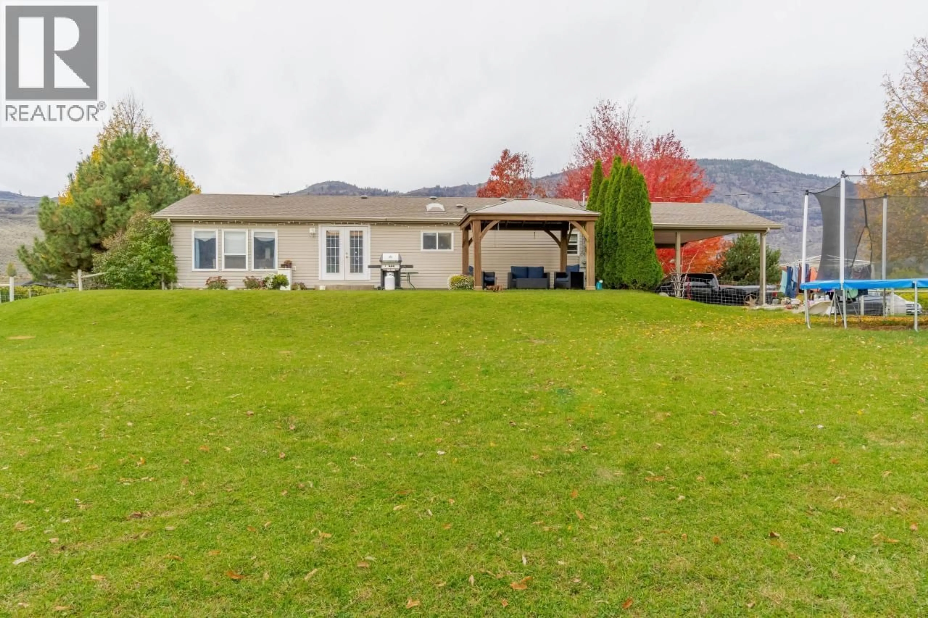 A pic from outside/outdoor area/front of a property/back of a property/a pic from drone, water/lake/river/ocean view for 3405 107TH STREET, Osoyoos British Columbia V0H1V4