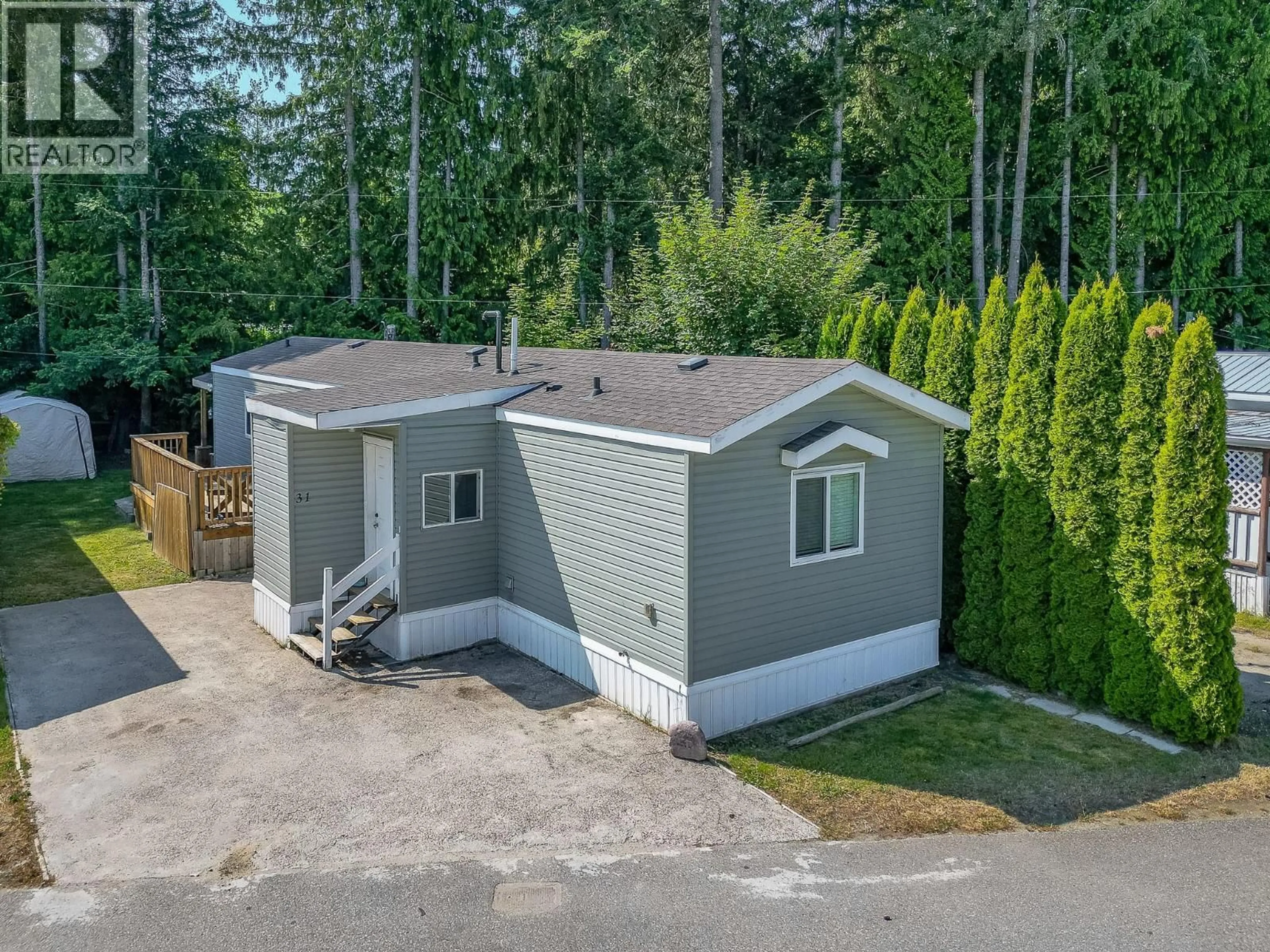 A pic from outside/outdoor area/front of a property/back of a property/a pic from drone, street for 31 - 501 KAPPEL STREET, Sicamous British Columbia V0E2V1