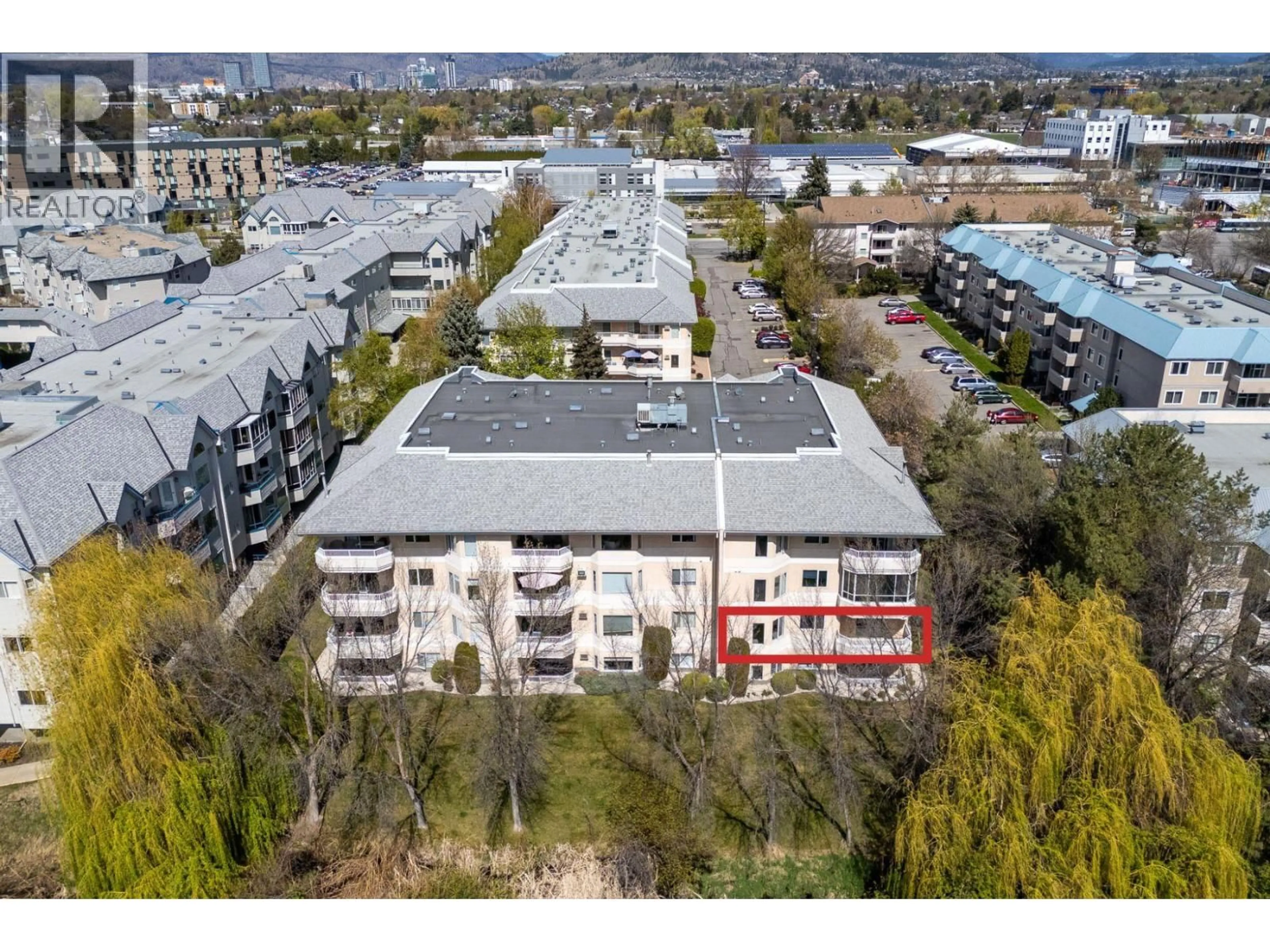 A pic from outside/outdoor area/front of a property/back of a property/a pic from drone, city buildings view from balcony for 202 - 987 KLO ROAD, Kelowna British Columbia V1Y9L2