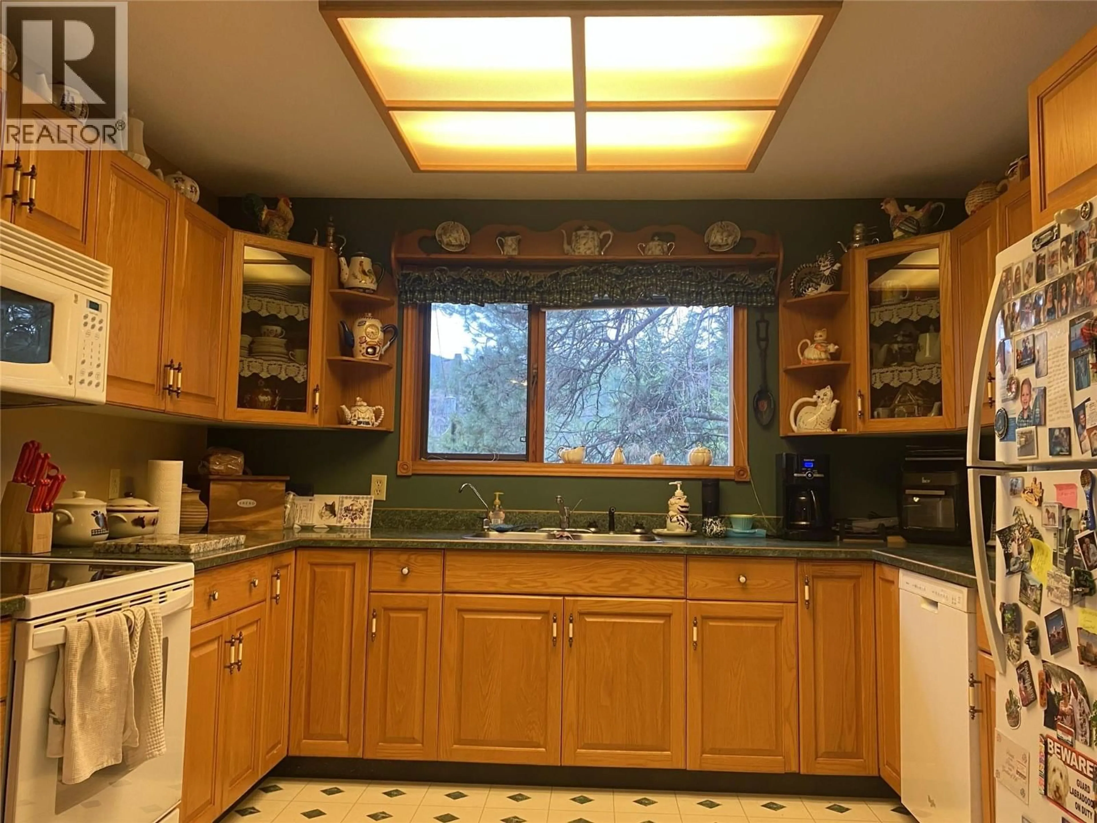 Standard kitchen, ceramic/tile floor for 9820 GRANBY ROAD, Grand Forks British Columbia V0H1H1