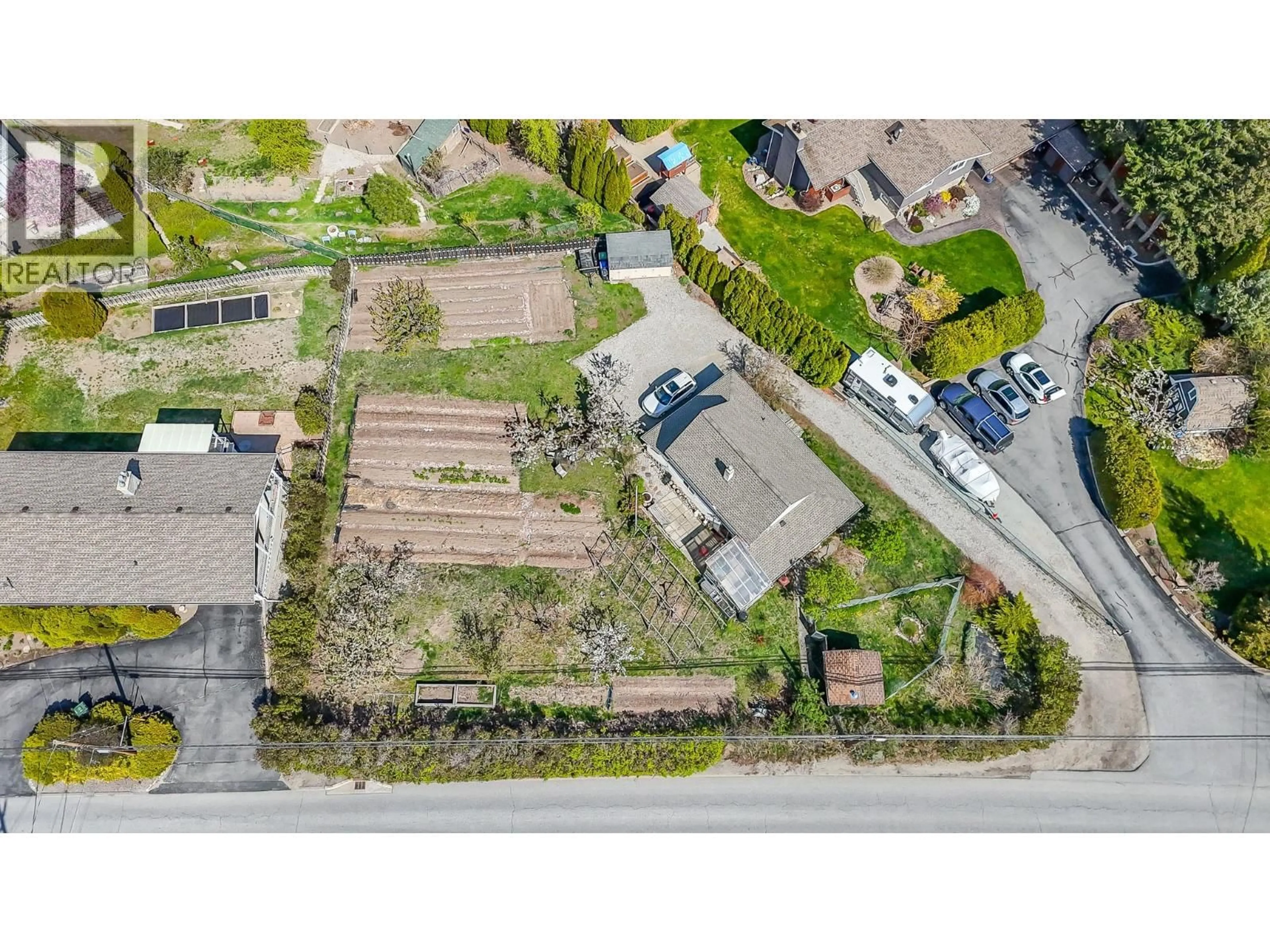 A pic from outside/outdoor area/front of a property/back of a property/a pic from drone, street for 12009 GIANTS HEAD ROAD, Summerland British Columbia V0H1Z7