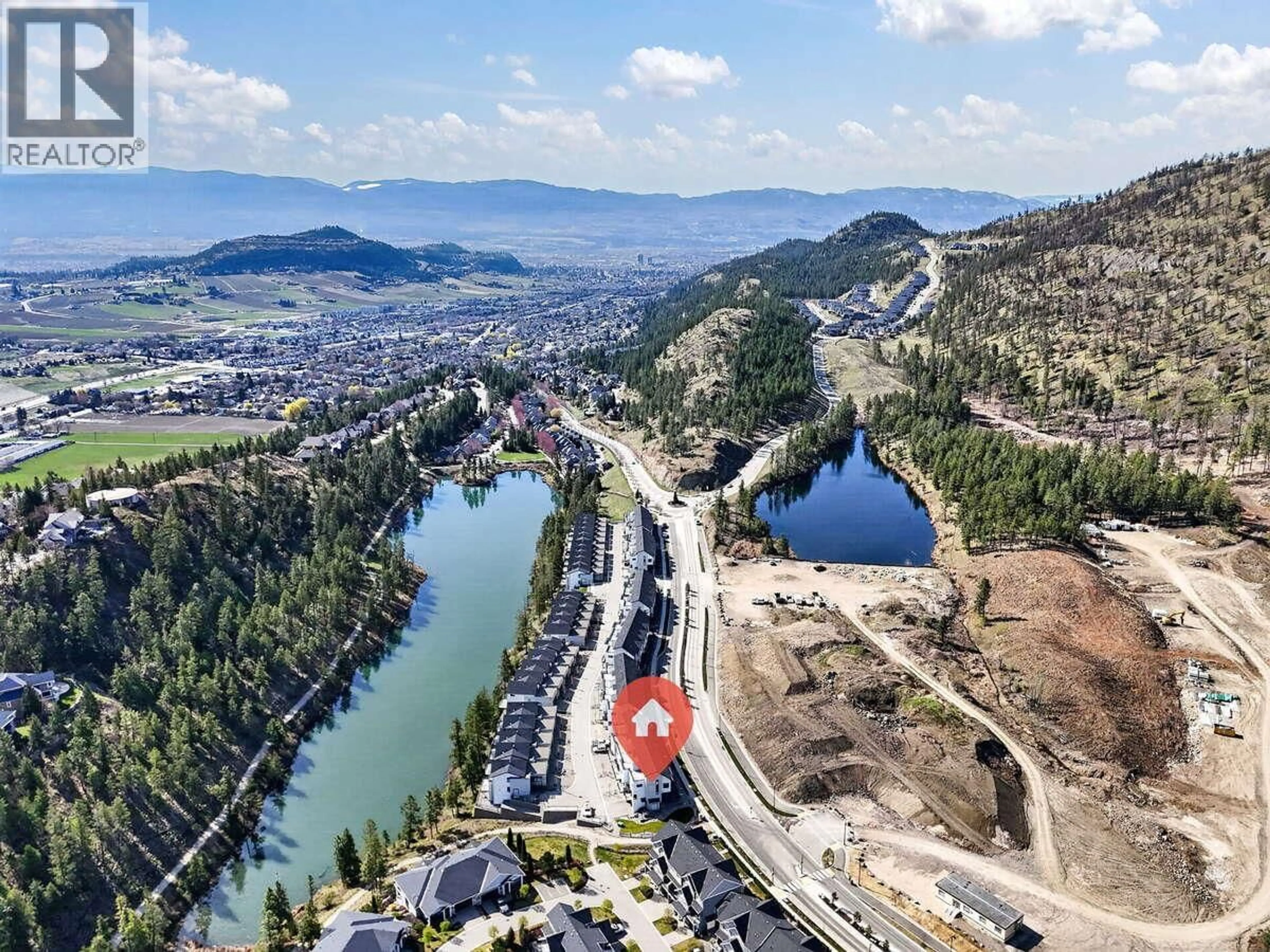 A pic from outside/outdoor area/front of a property/back of a property/a pic from drone, water/lake/river/ocean view for 1 - 1550 UNION ROAD, Kelowna British Columbia V1V0G9