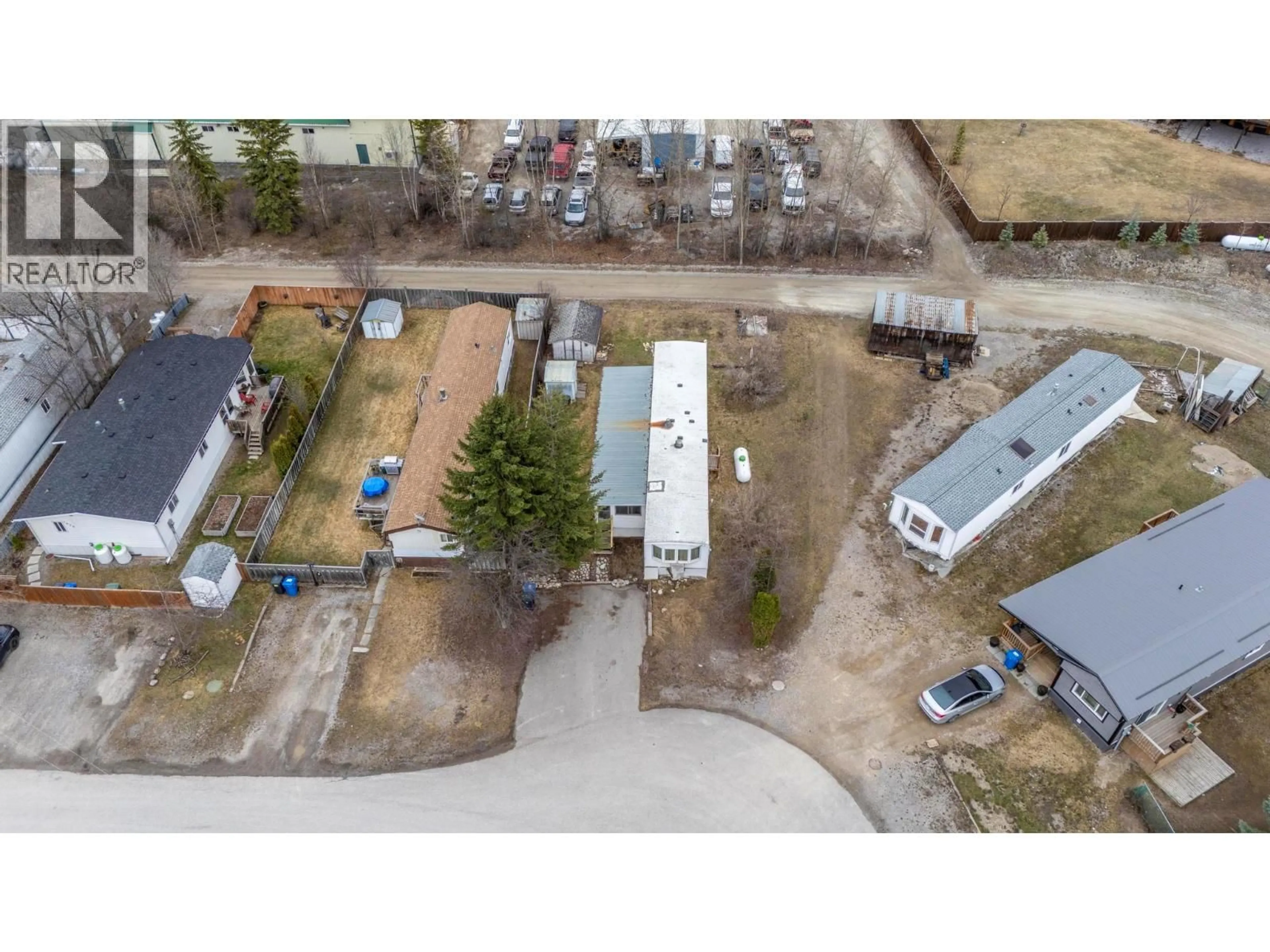 A pic from outside/outdoor area/front of a property/back of a property/a pic from drone, street for 1029 KING CRESCENT, Golden British Columbia V0A1H2