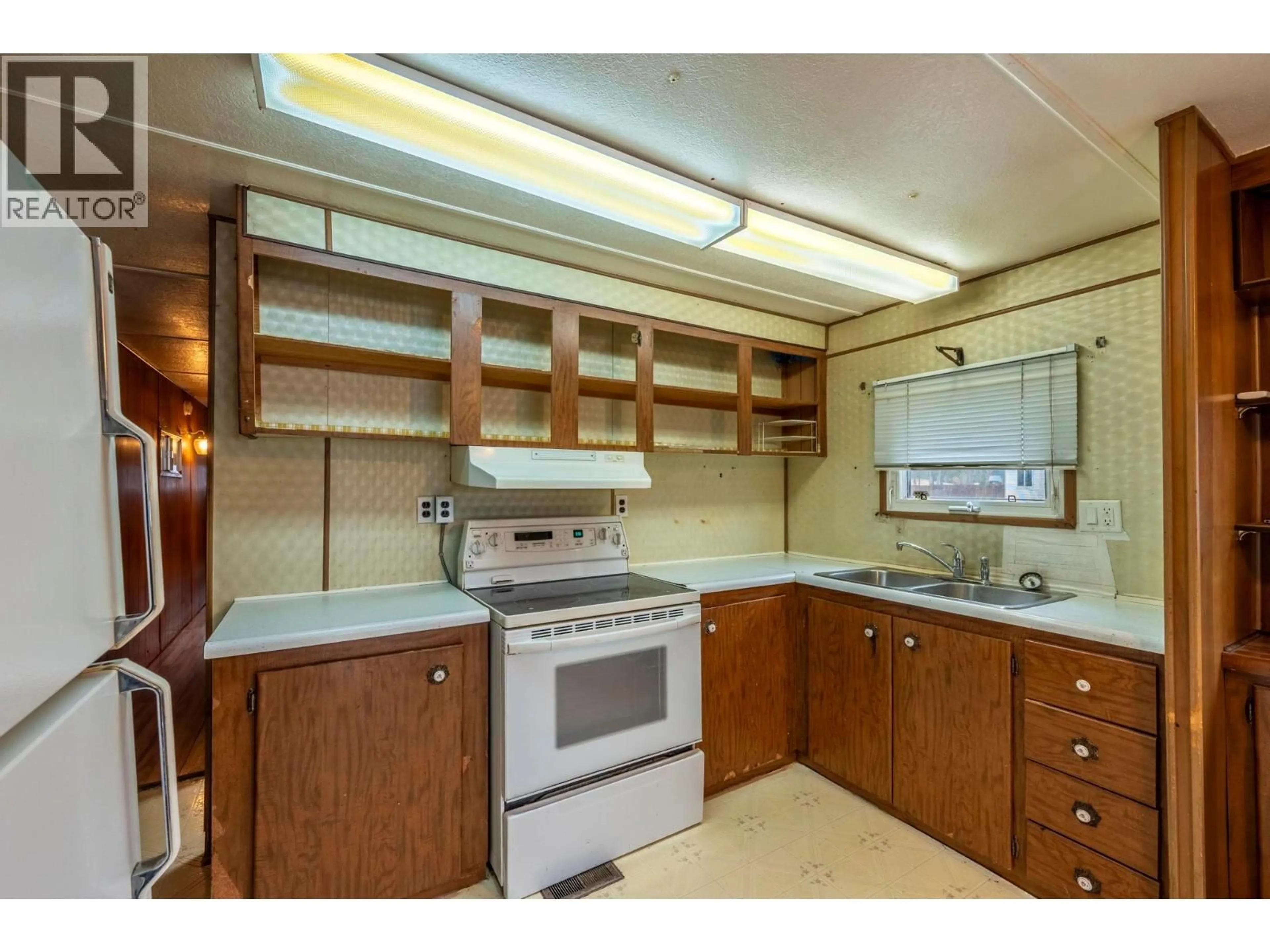 Standard kitchen, wood/laminate floor for 1029 KING CRESCENT, Golden British Columbia V0A1H2