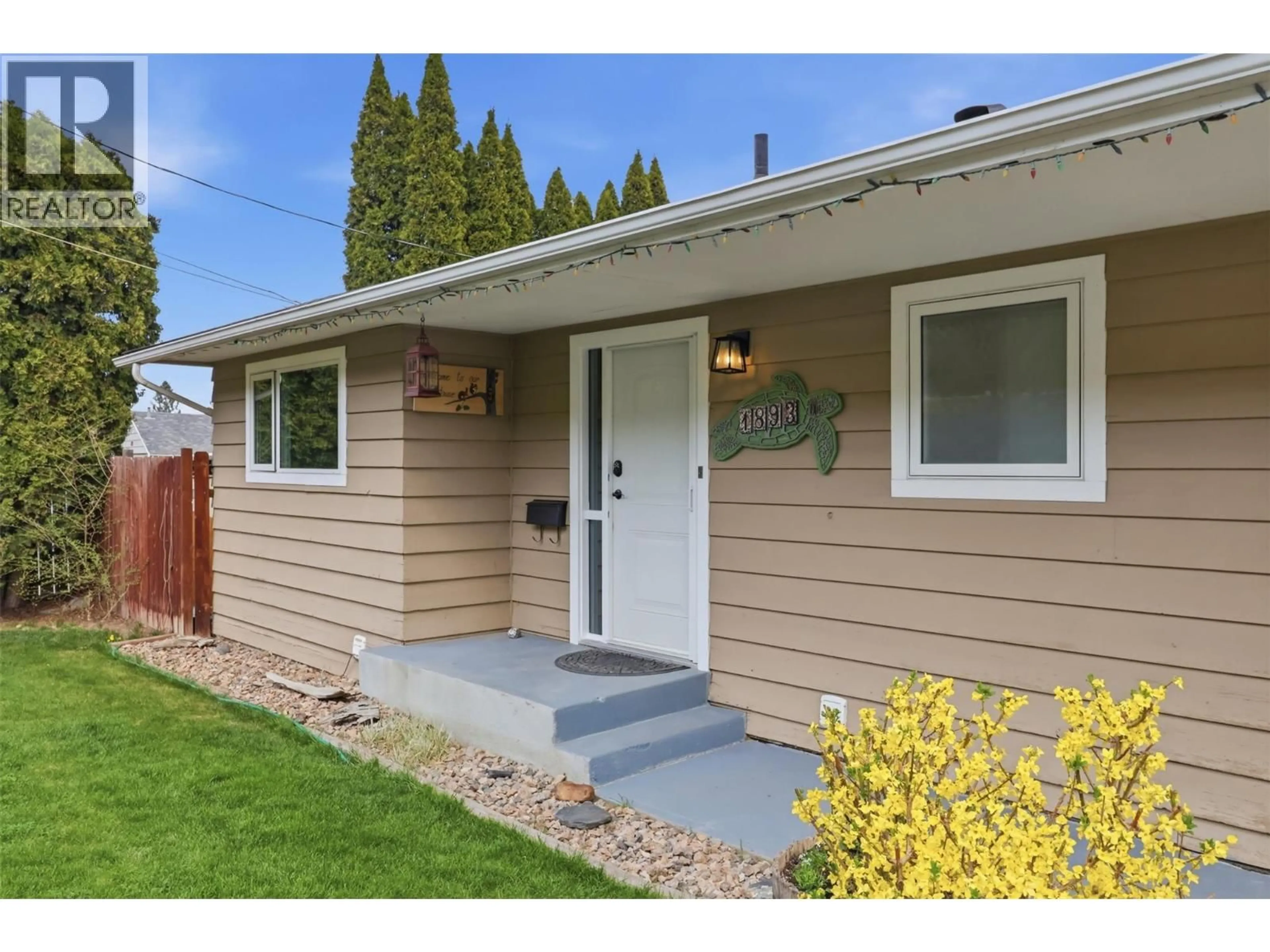 Home with vinyl exterior material, street for 1893 WESTSYDE ROAD, Kamloops British Columbia V2B7B9