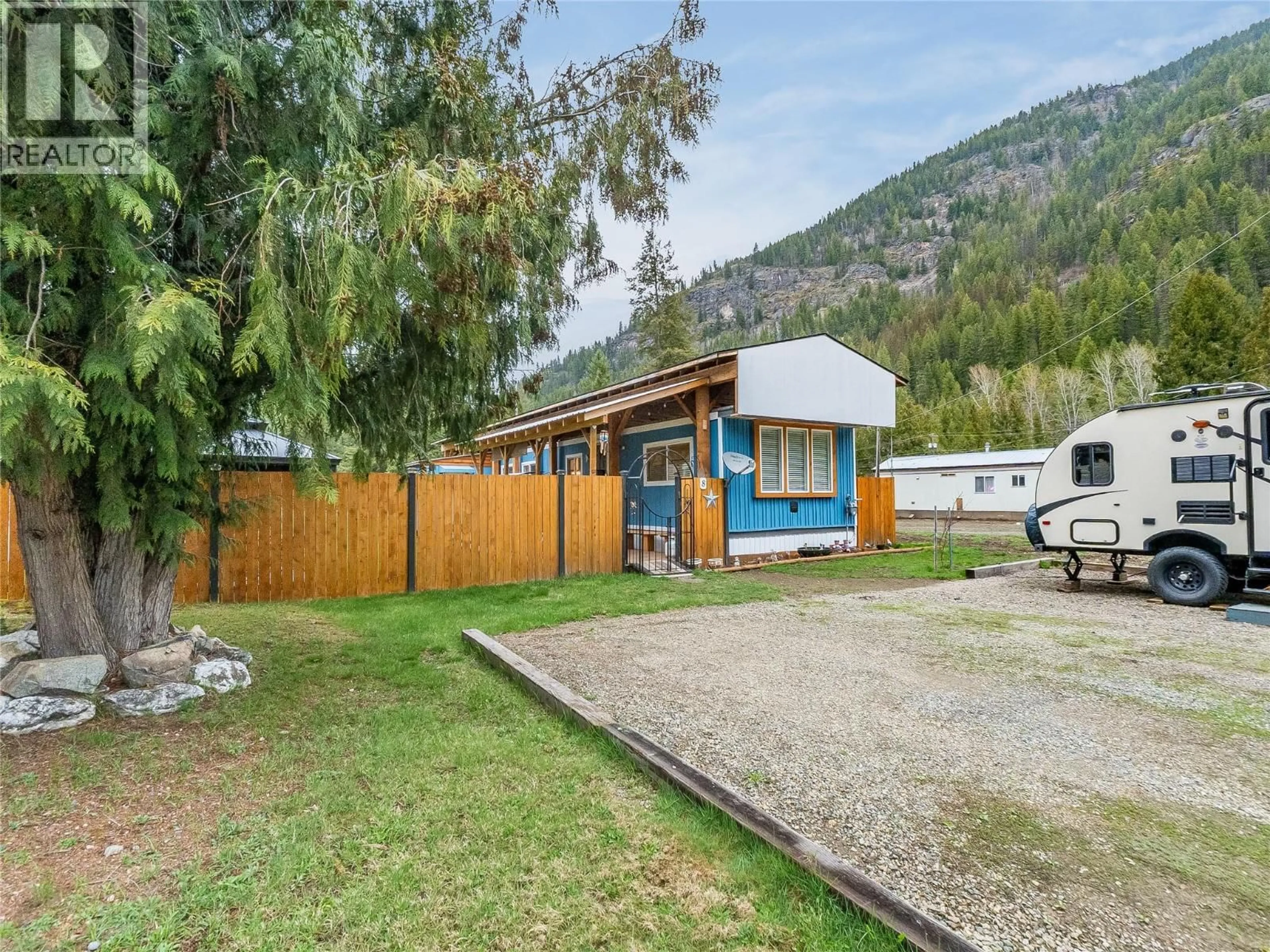 A pic from outside/outdoor area/front of a property/back of a property/a pic from drone, mountain view for 8 - 916 AIRPORT ROAD, Salmo British Columbia V0G1Z0