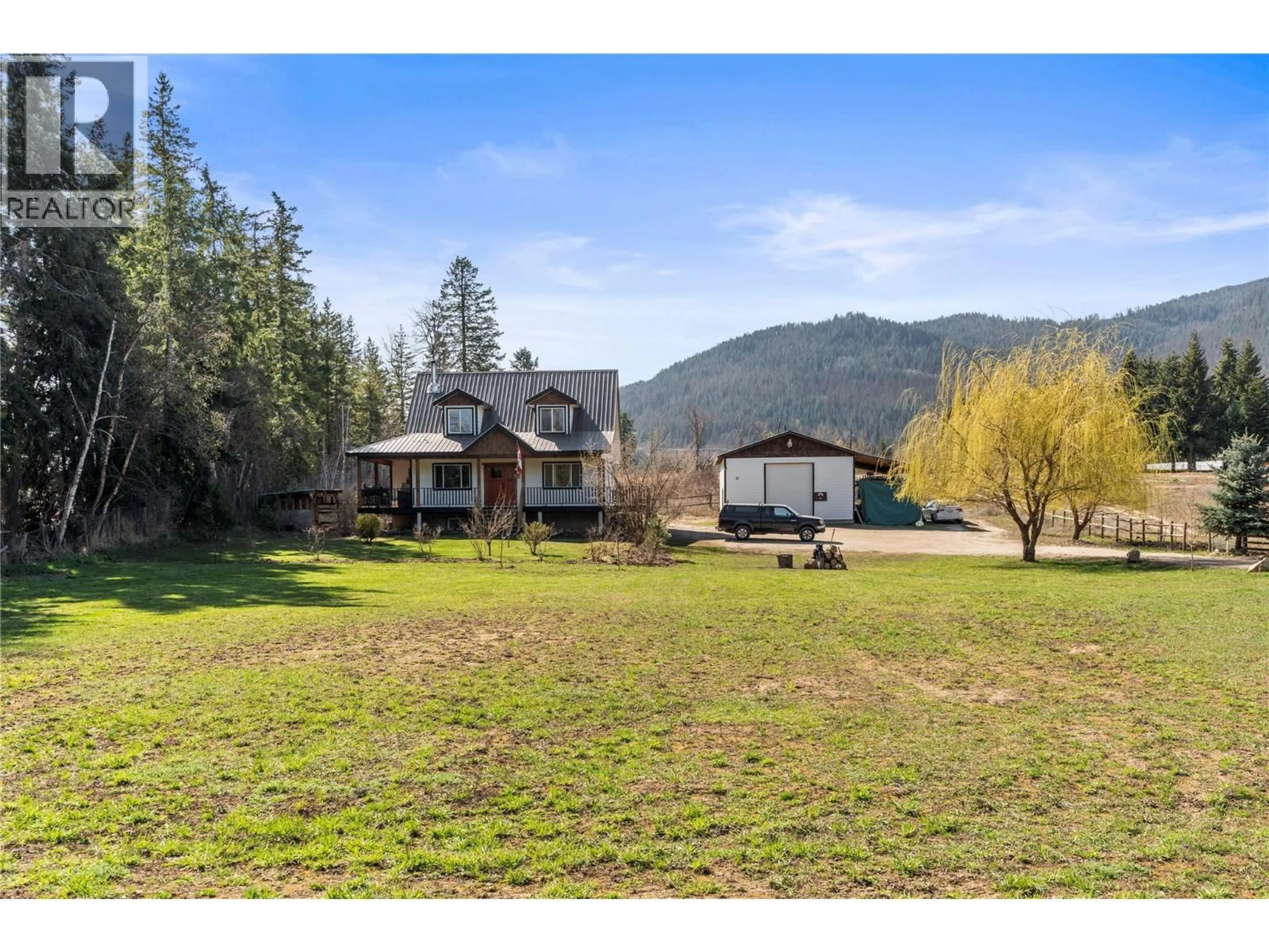 A pic from outside/outdoor area/front of a property/back of a property/a pic from drone, mountain view for 4150 20 AVENUE SOUTHEAST, Salmon Arm British Columbia V1E1X9