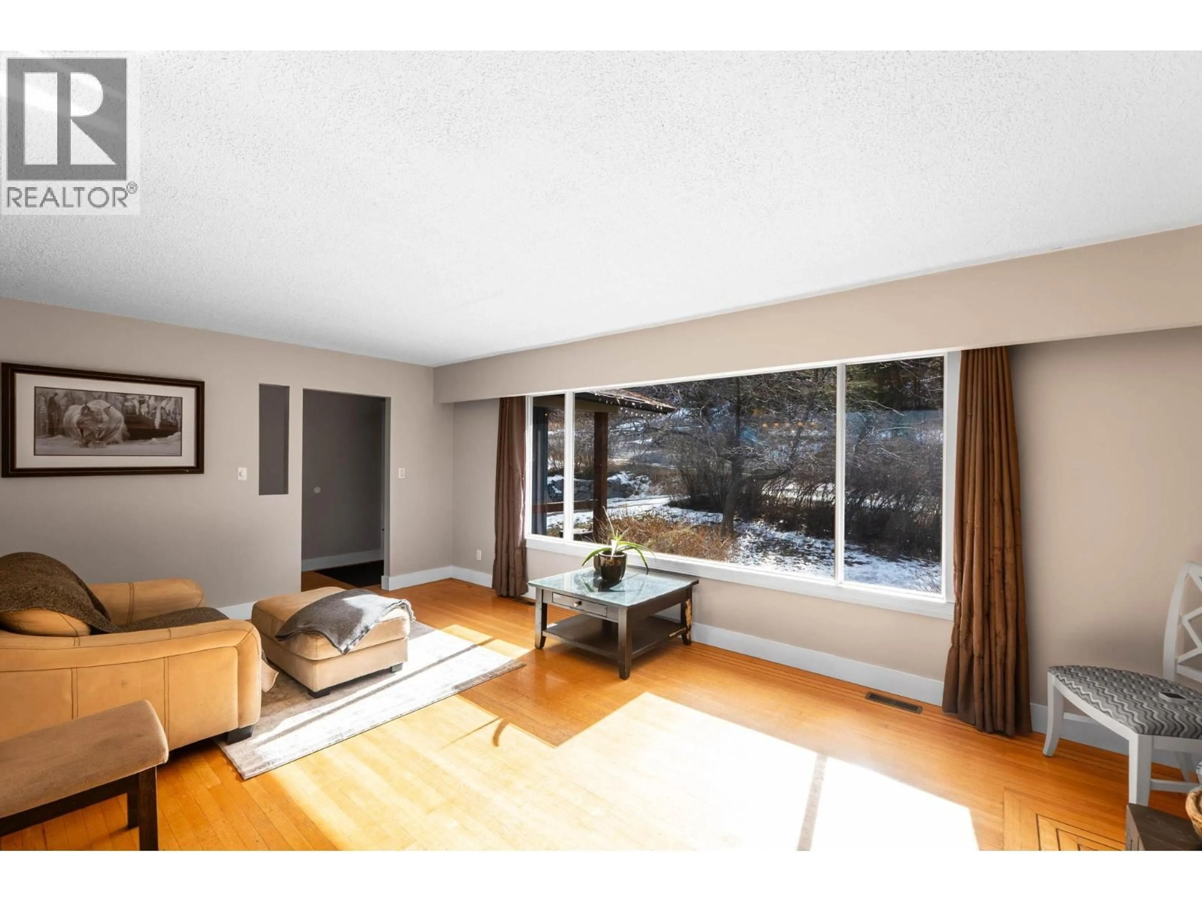Living room with furniture, wood/laminate floor for 448 DARCY MOUNTAIN ROAD, Princeton British Columbia V0X1W0