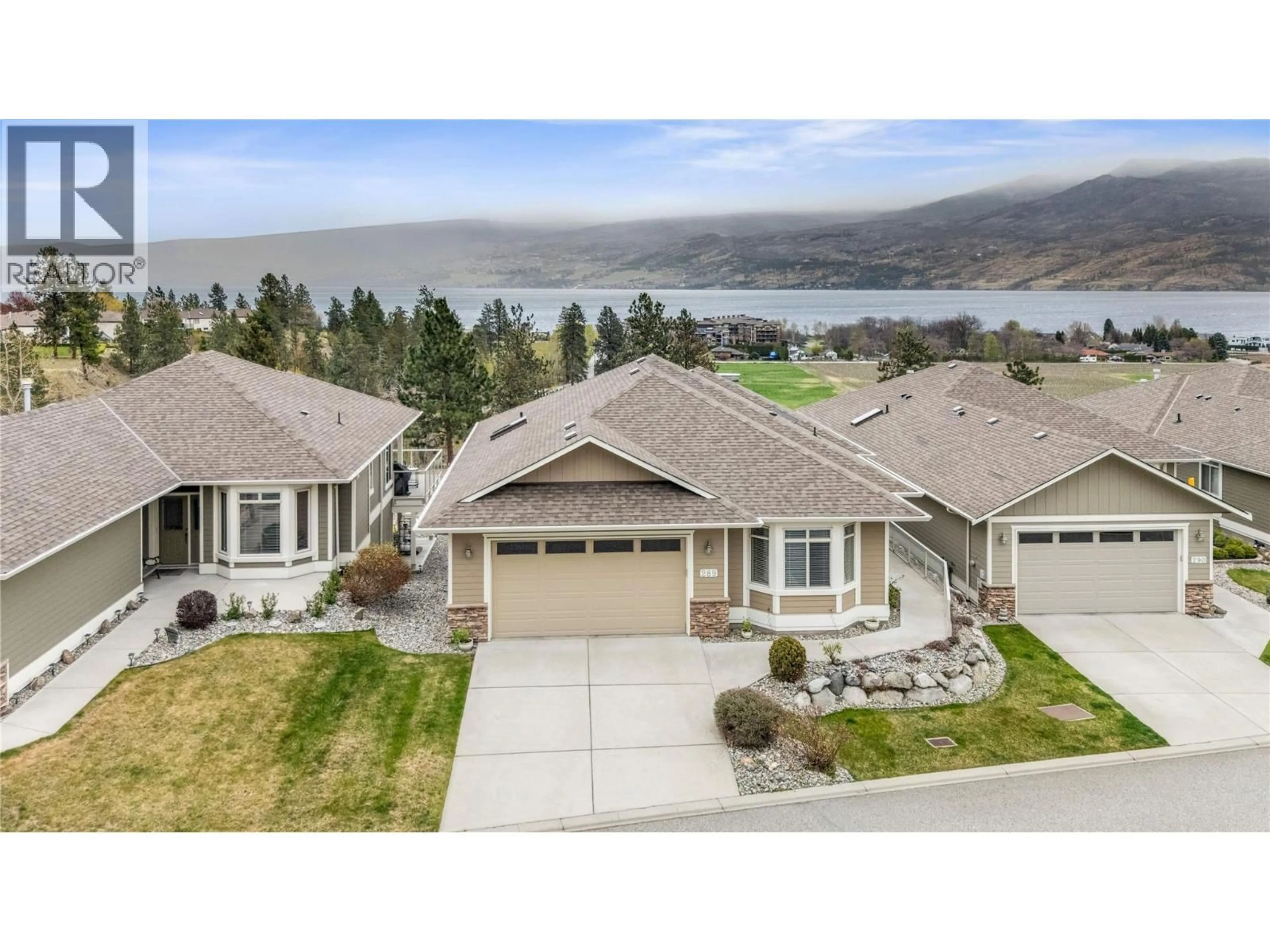 A pic from outside/outdoor area/front of a property/back of a property/a pic from drone, water/lake/river/ocean view for 289 - 4035 GELLATLY ROAD, West Kelowna British Columbia V4T1R7