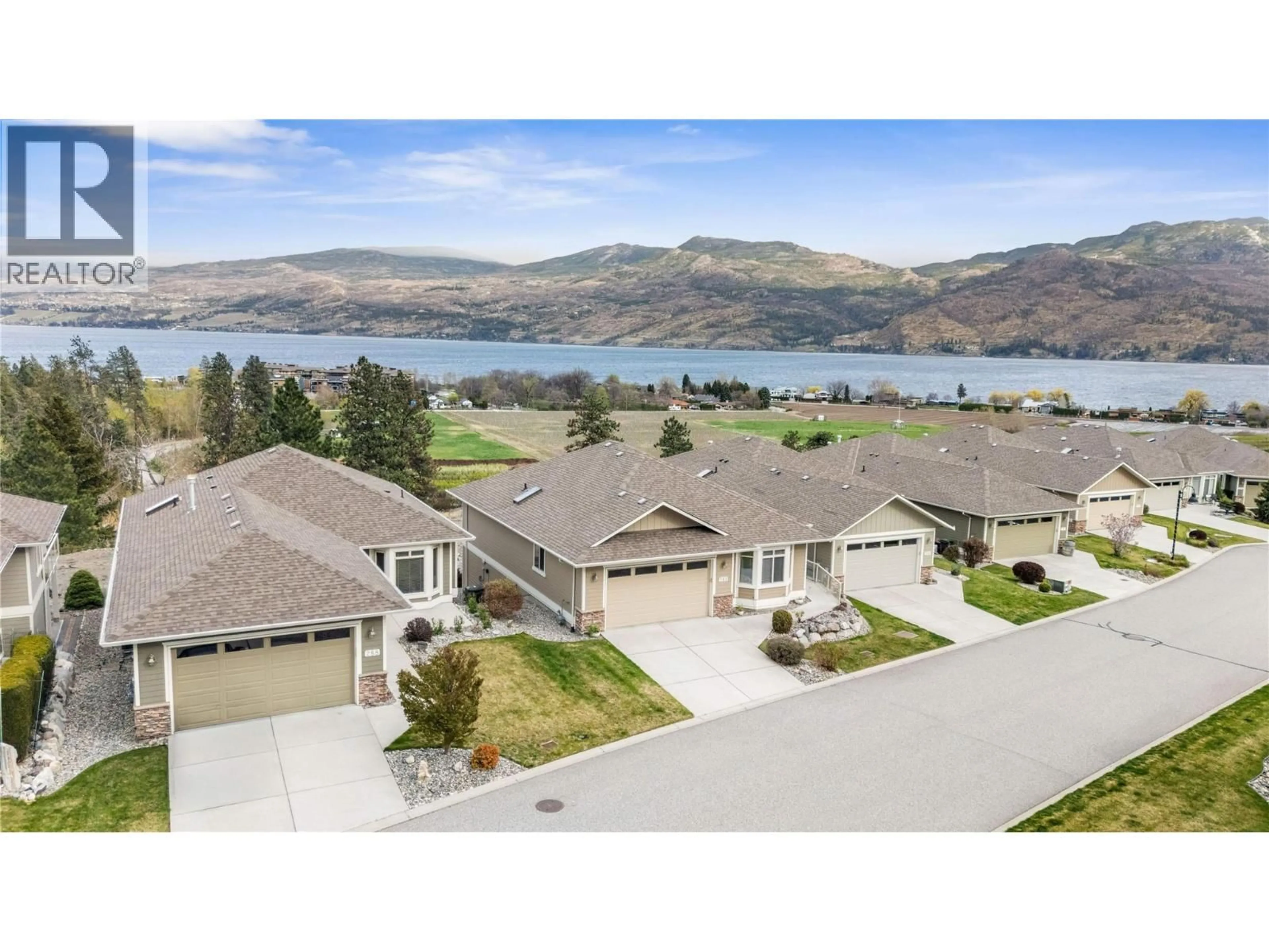 A pic from outside/outdoor area/front of a property/back of a property/a pic from drone, water/lake/river/ocean view for 289 - 4035 GELLATLY ROAD, West Kelowna British Columbia V4T1R7