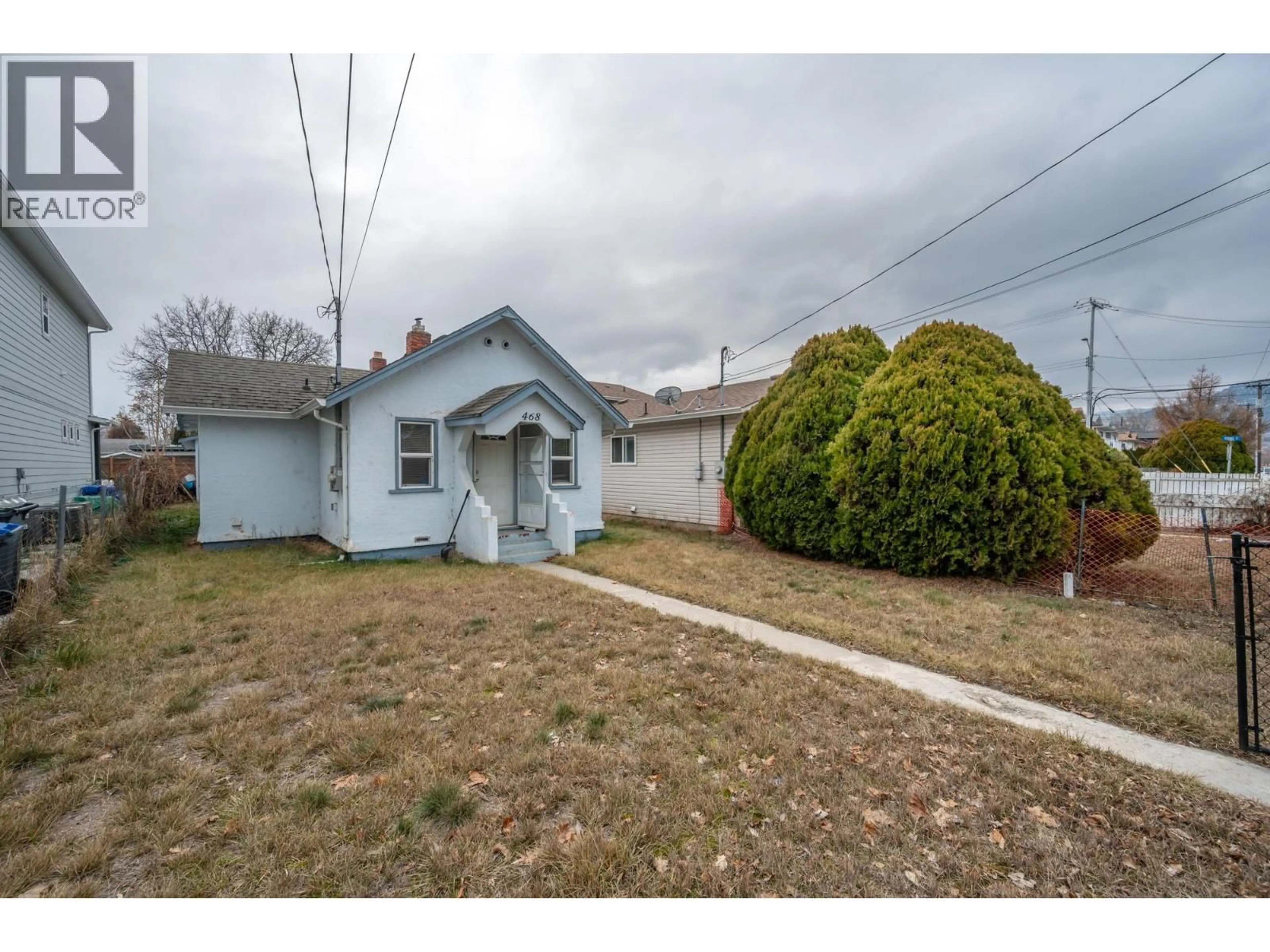 A pic from outside/outdoor area/front of a property/back of a property/a pic from drone, street for 468 WADE AVENUE WEST, Penticton British Columbia V2A1V4