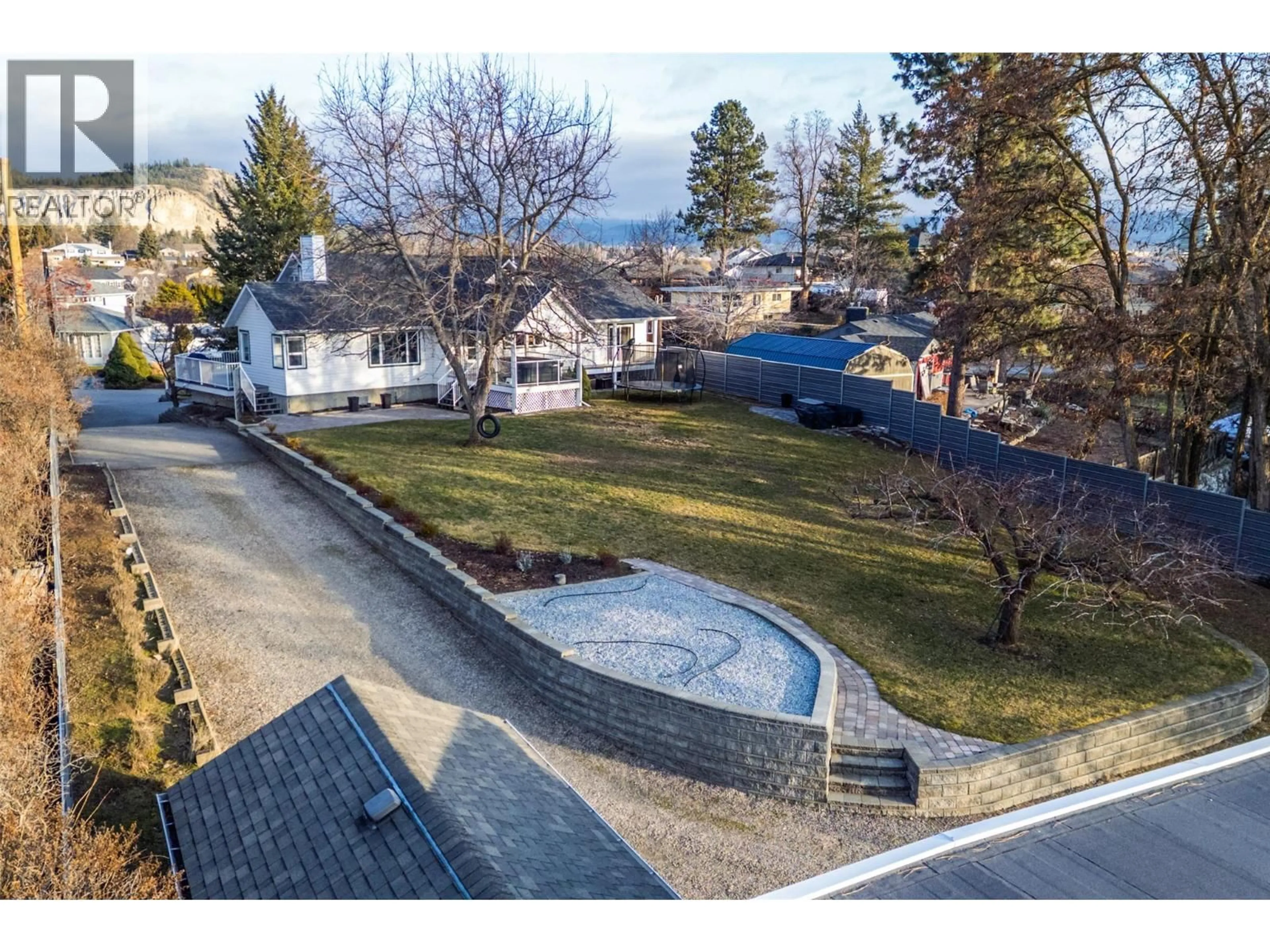 A pic from outside/outdoor area/front of a property/back of a property/a pic from drone, unknown for 1150 KELVIEW STREET, Kelowna British Columbia V1Y3N8