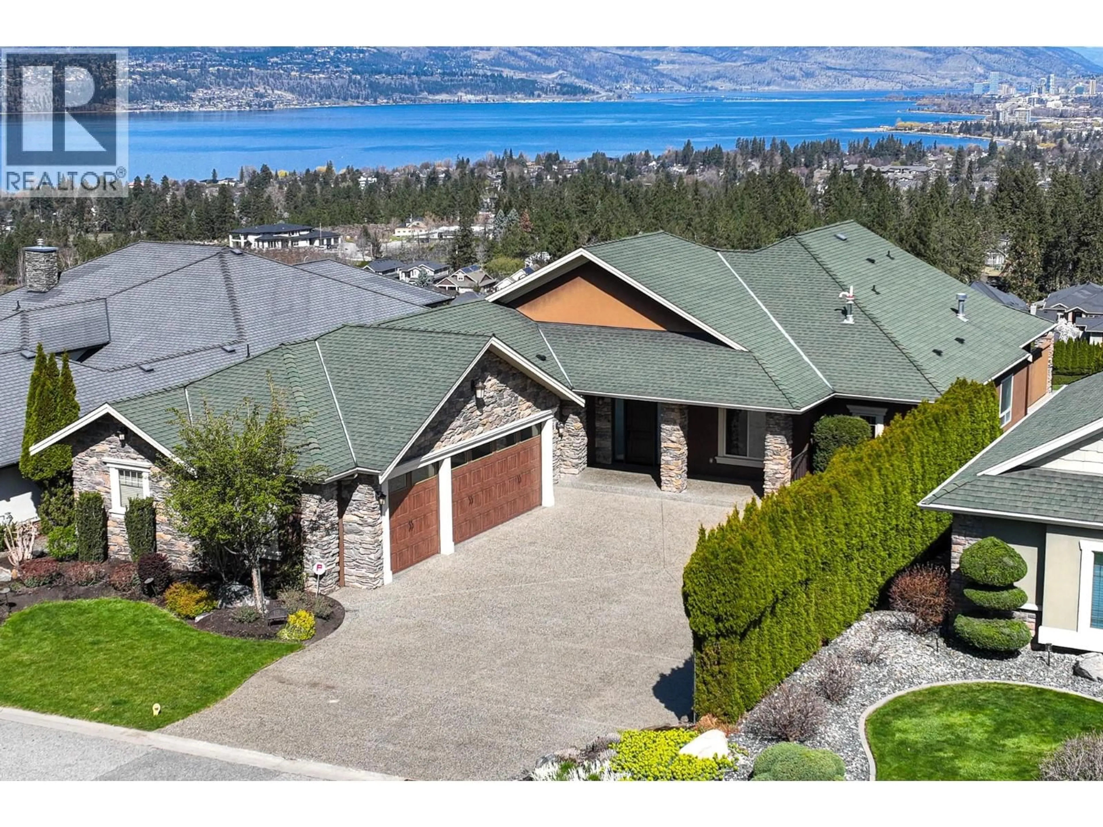 A pic from outside/outdoor area/front of a property/back of a property/a pic from drone, water/lake/river/ocean view for 648 ALMANDINE COURT, Kelowna British Columbia V1W4Z5