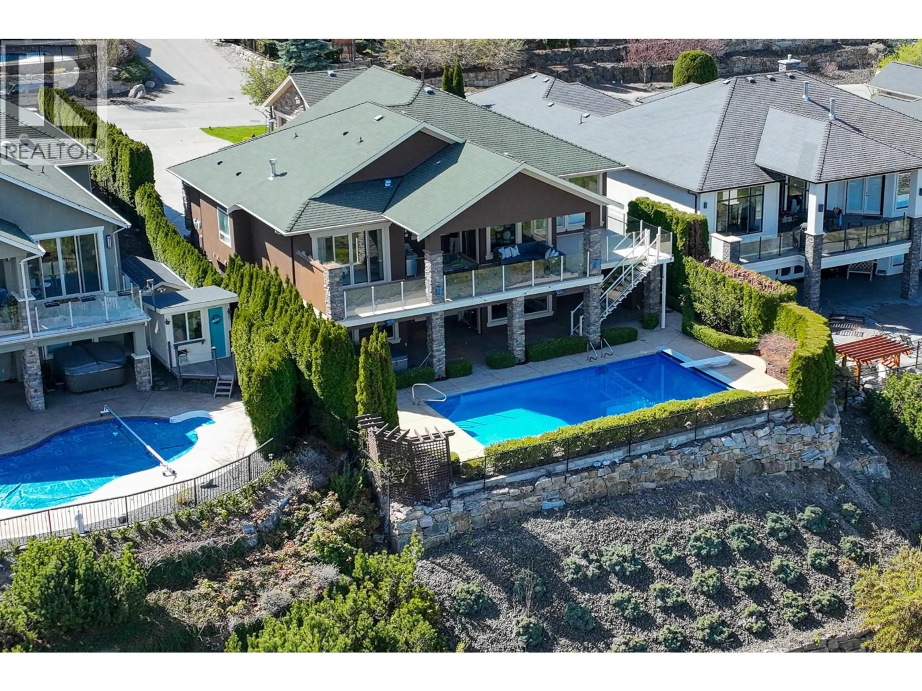 A pic from outside/outdoor area/front of a property/back of a property/a pic from drone, unknown for 648 ALMANDINE COURT, Kelowna British Columbia V1W4Z5