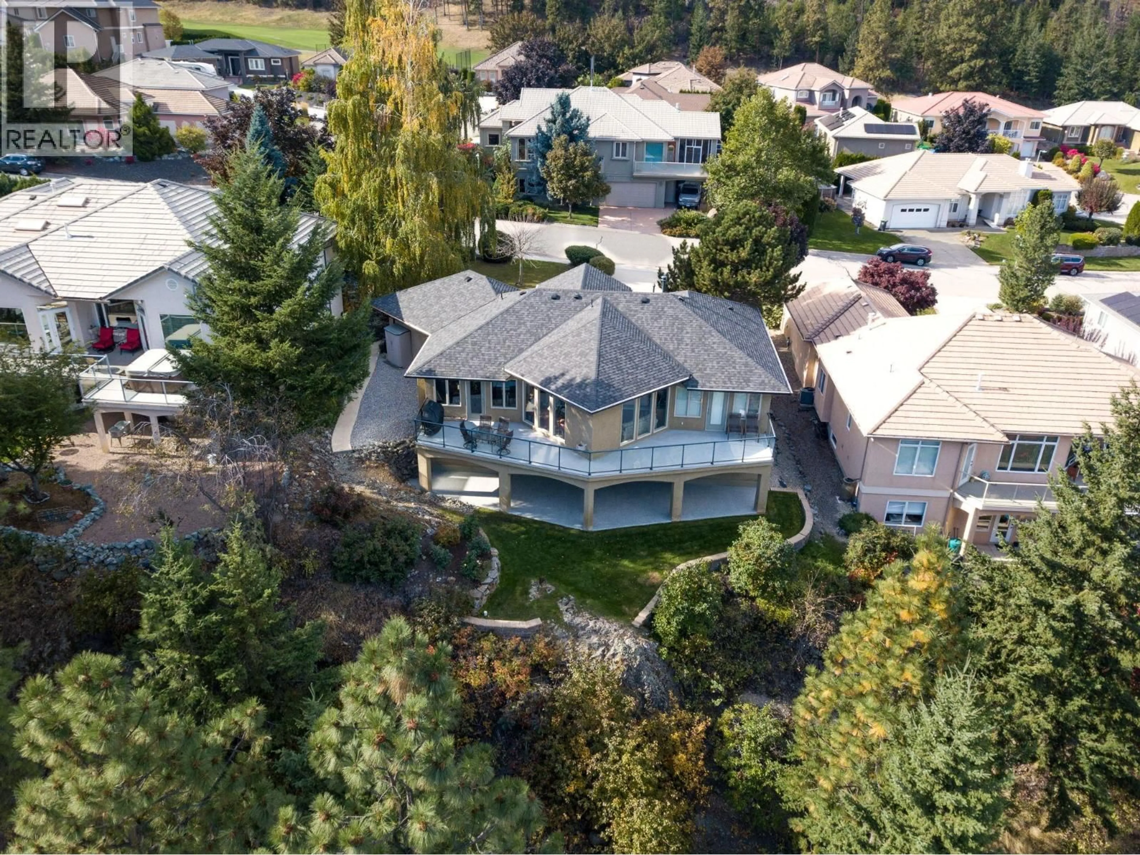 A pic from outside/outdoor area/front of a property/back of a property/a pic from drone, mountain view for 2229 CAPISTRANO DRIVE, Kelowna British Columbia V1V2A2