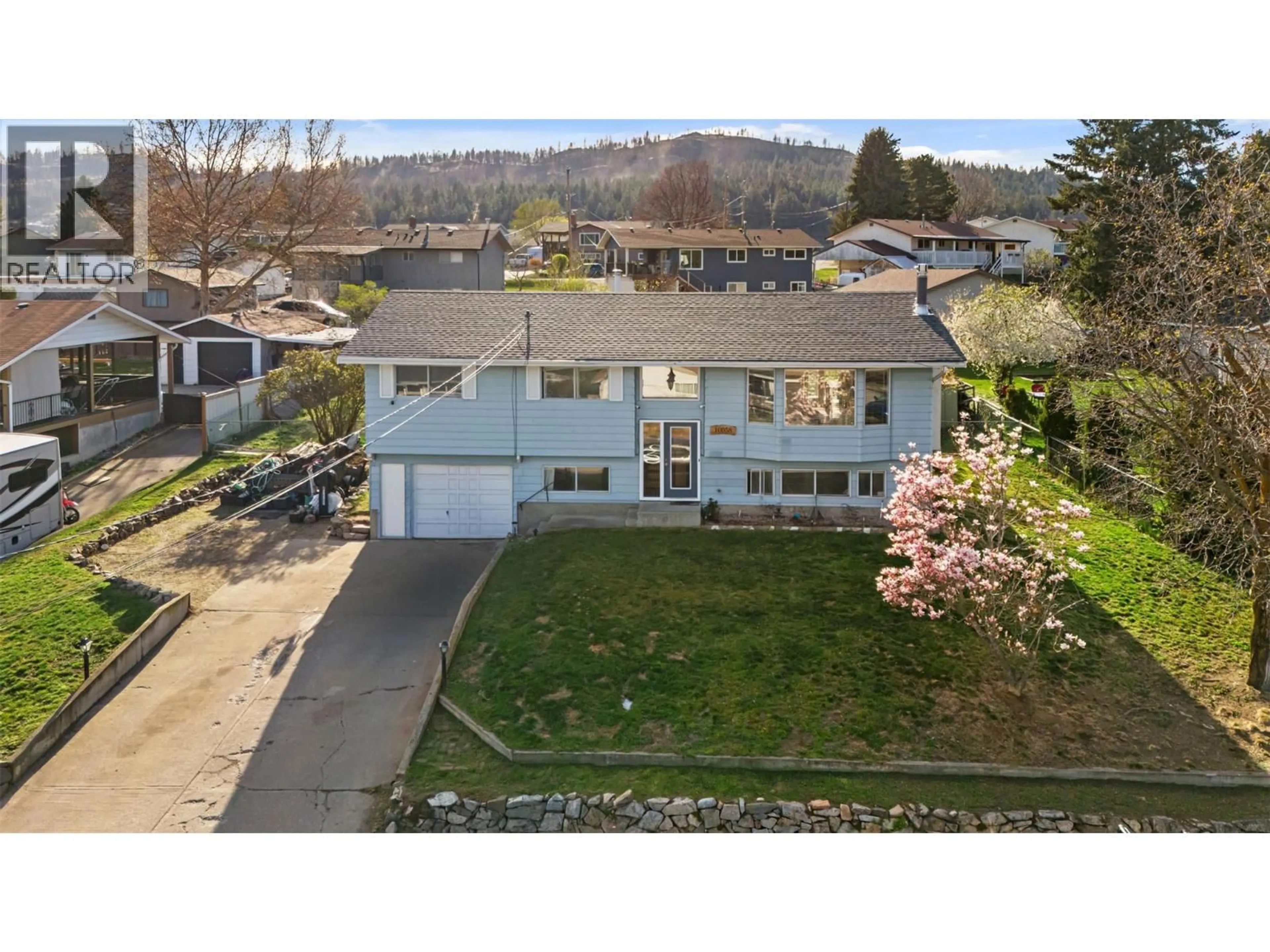 A pic from outside/outdoor area/front of a property/back of a property/a pic from drone, street for 10058 KEL VERN CRESCENT, Lake Country British Columbia V4V1L3