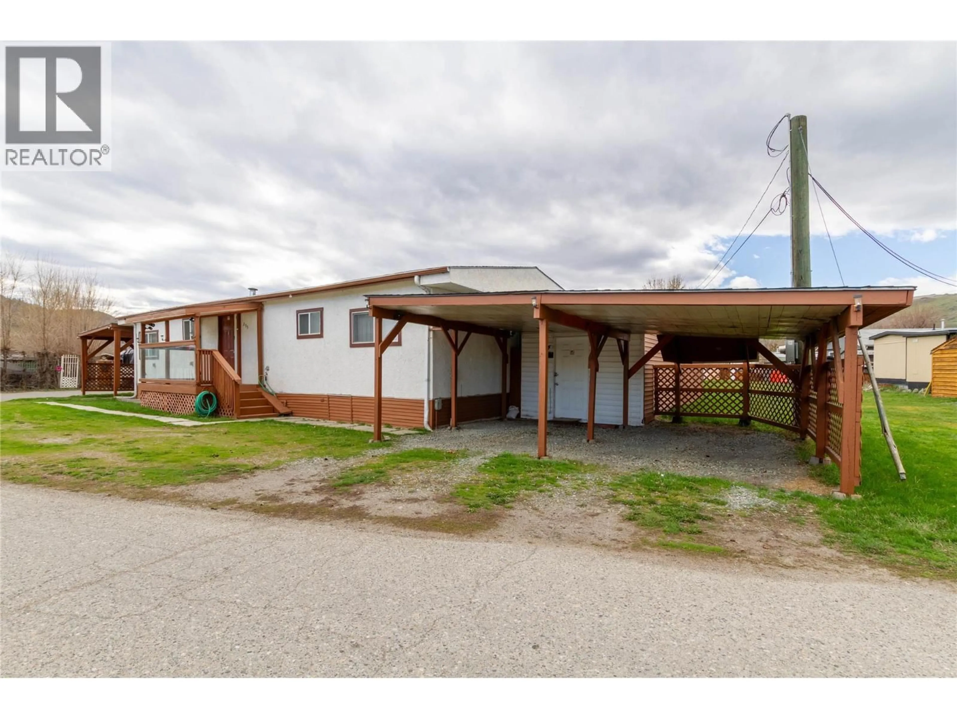 A pic from outside/outdoor area/front of a property/back of a property/a pic from drone, building for 273 - 6900 TRONSON ROAD, Vernon British Columbia V1H1X7