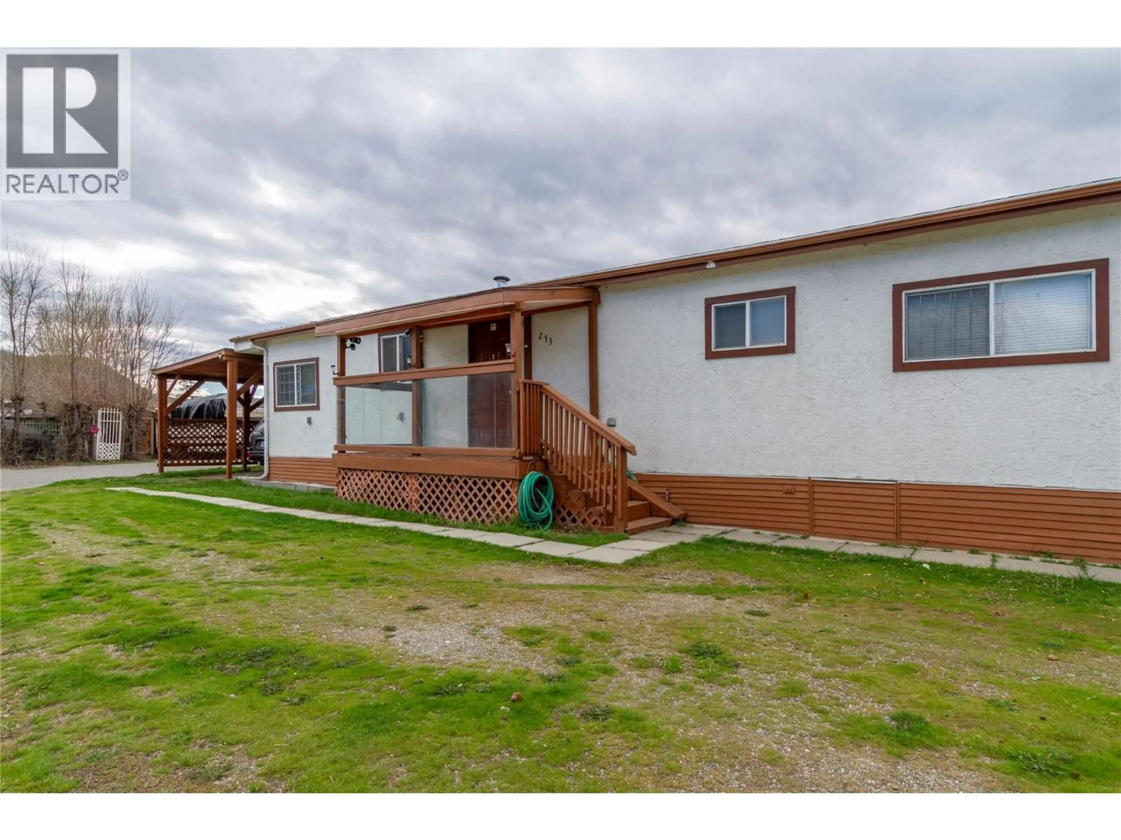 A pic from outside/outdoor area/front of a property/back of a property/a pic from drone, unknown for 273 - 6900 TRONSON ROAD, Vernon British Columbia V1H1X7