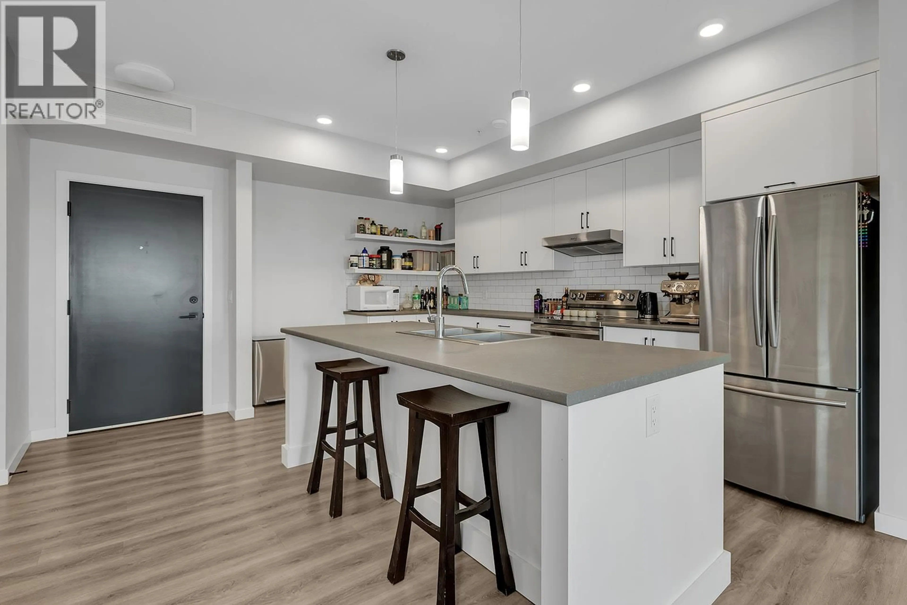 Open concept kitchen, unknown for 309 - 1215 ST. PAUL STREET, Kelowna British Columbia V1Y2C7