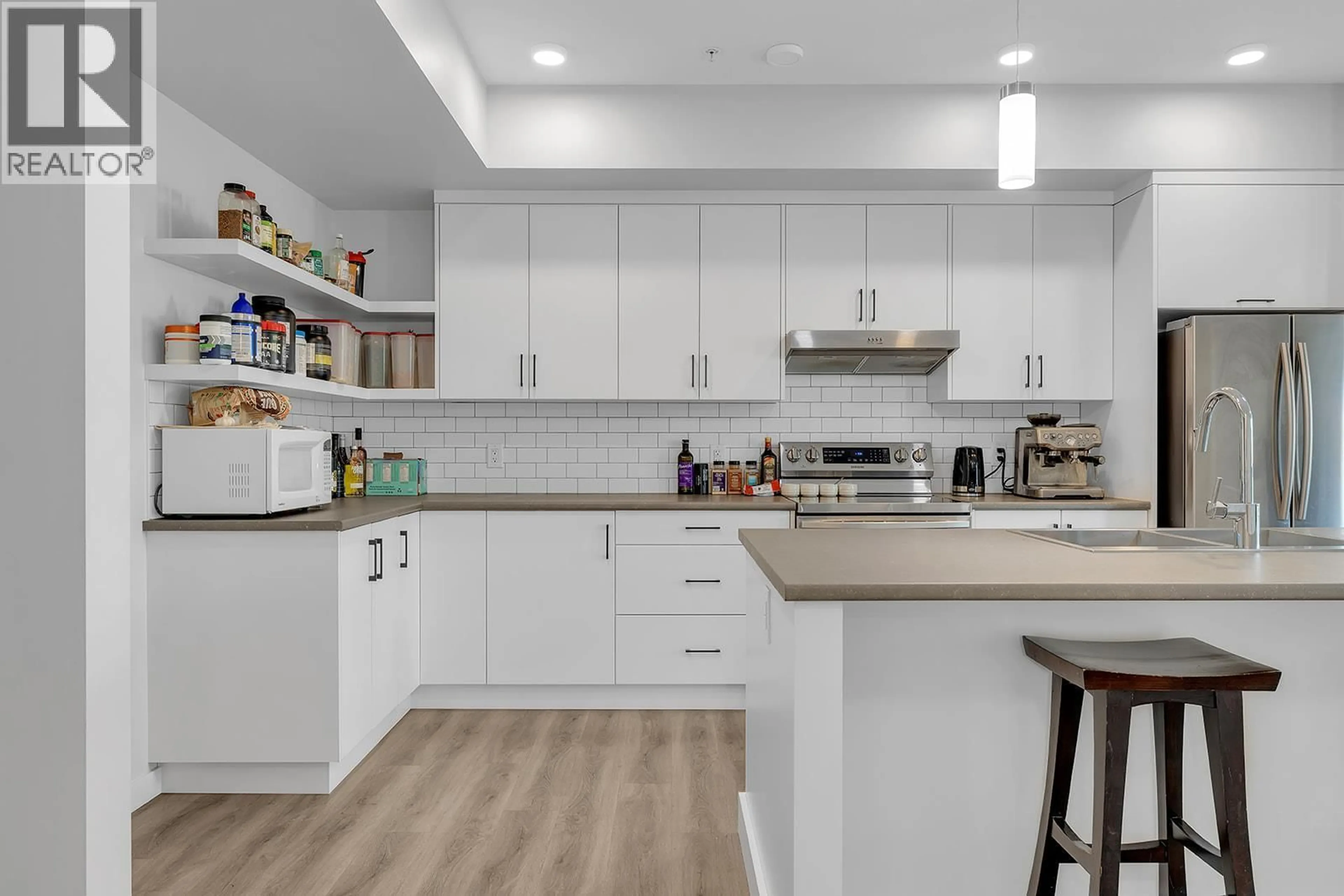 Open concept kitchen, unknown for 309 - 1215 ST. PAUL STREET, Kelowna British Columbia V1Y2C7