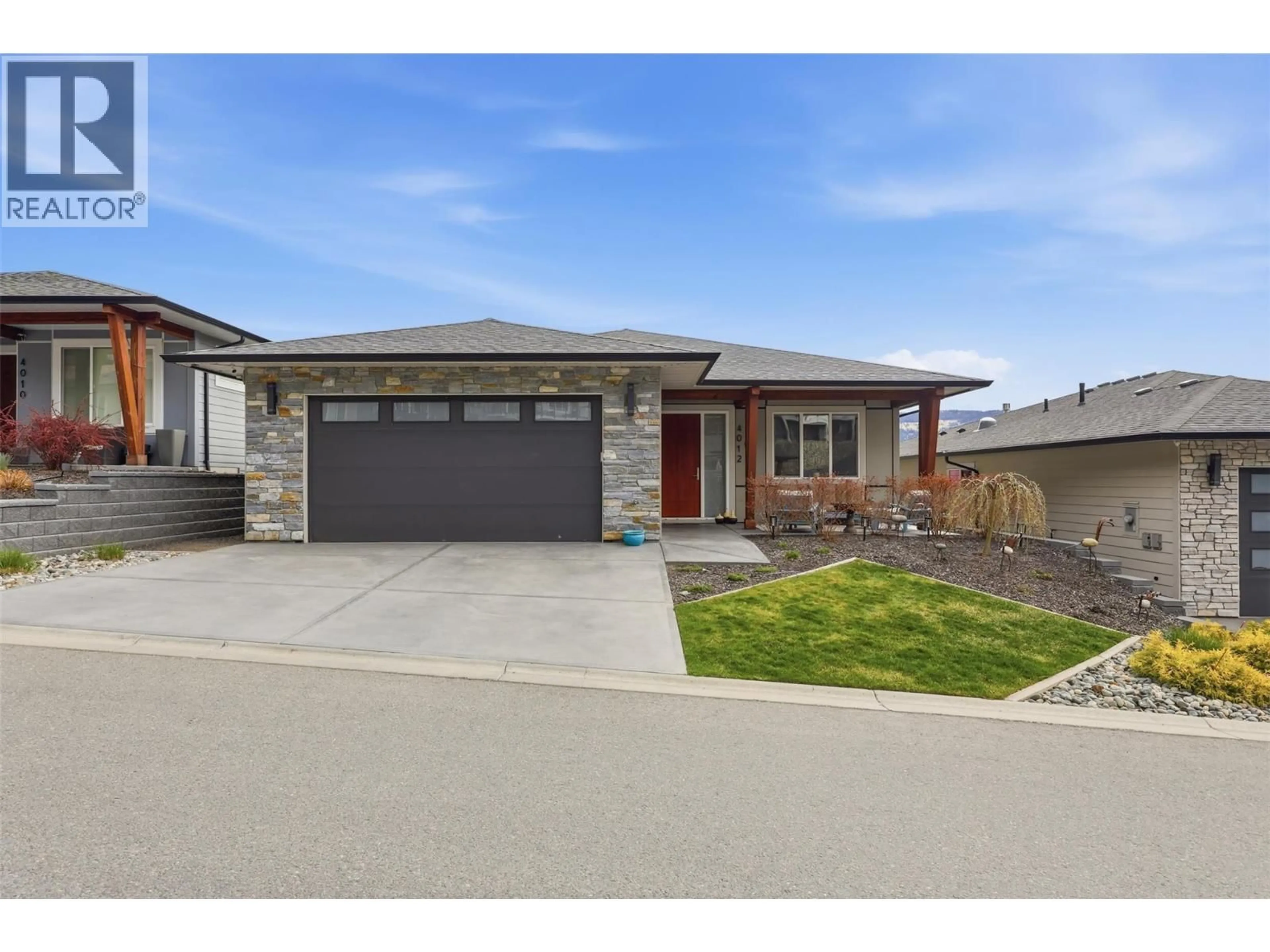 Home with brick exterior material, street for 4012 RIO VISTA WAY, Kamloops British Columbia V2H0E1