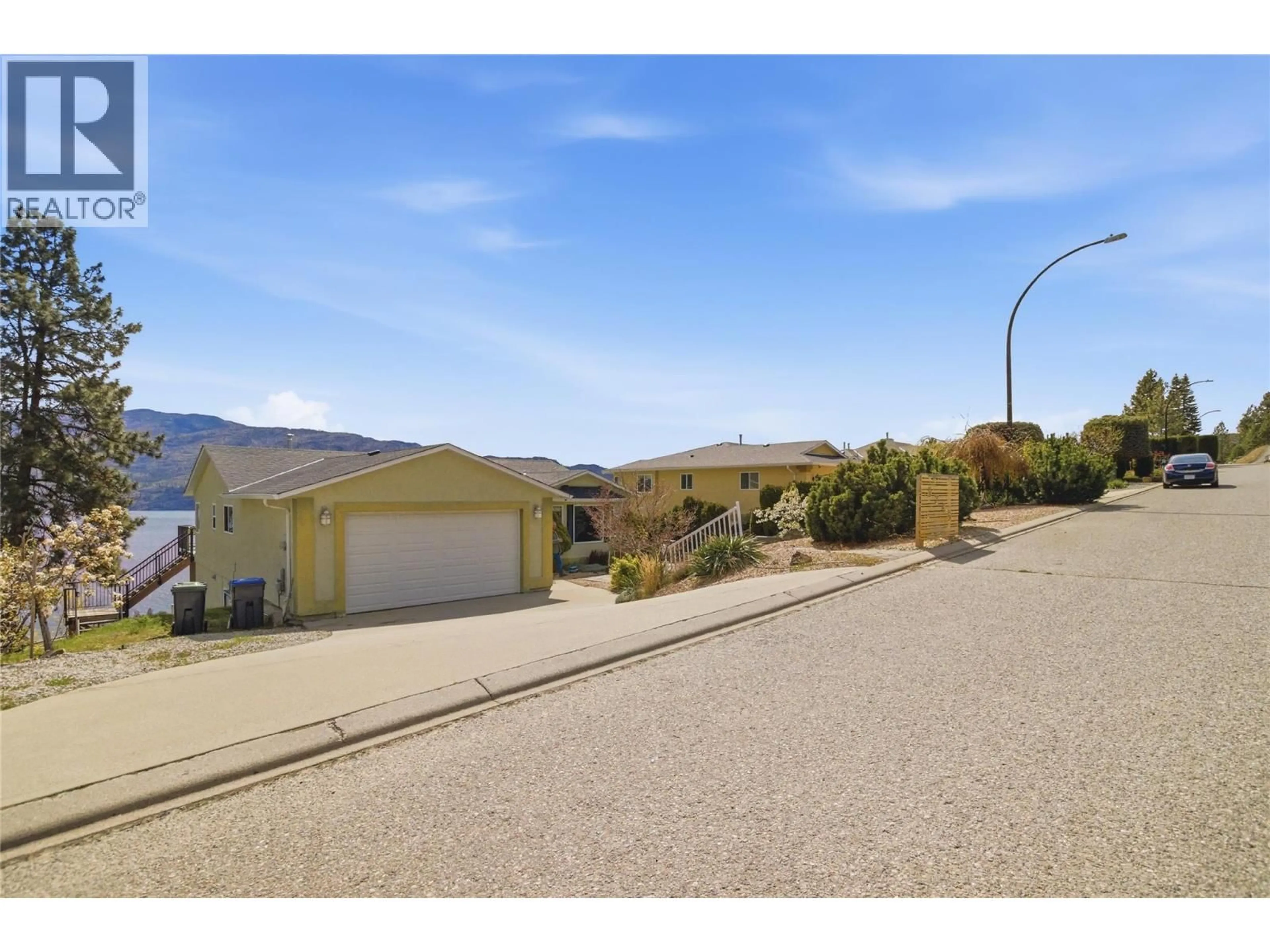 A pic from outside/outdoor area/front of a property/back of a property/a pic from drone, street for 5245 SUTHERLAND ROAD, Peachland British Columbia V0H1X2