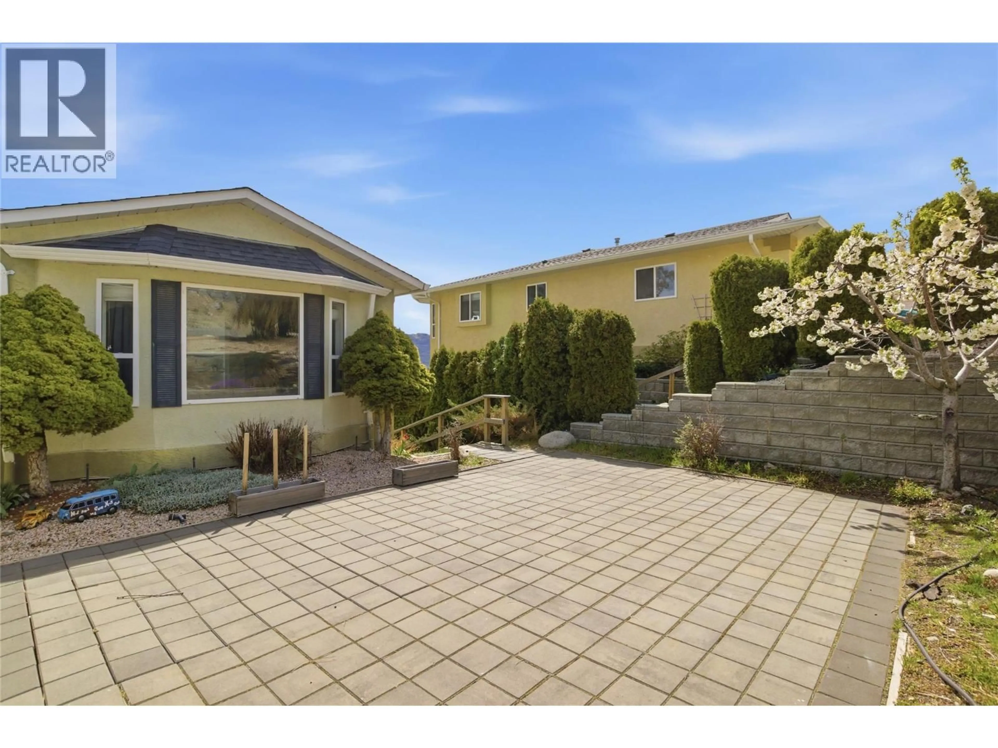 A pic from outside/outdoor area/front of a property/back of a property/a pic from drone, street for 5245 SUTHERLAND ROAD, Peachland British Columbia V0H1X2