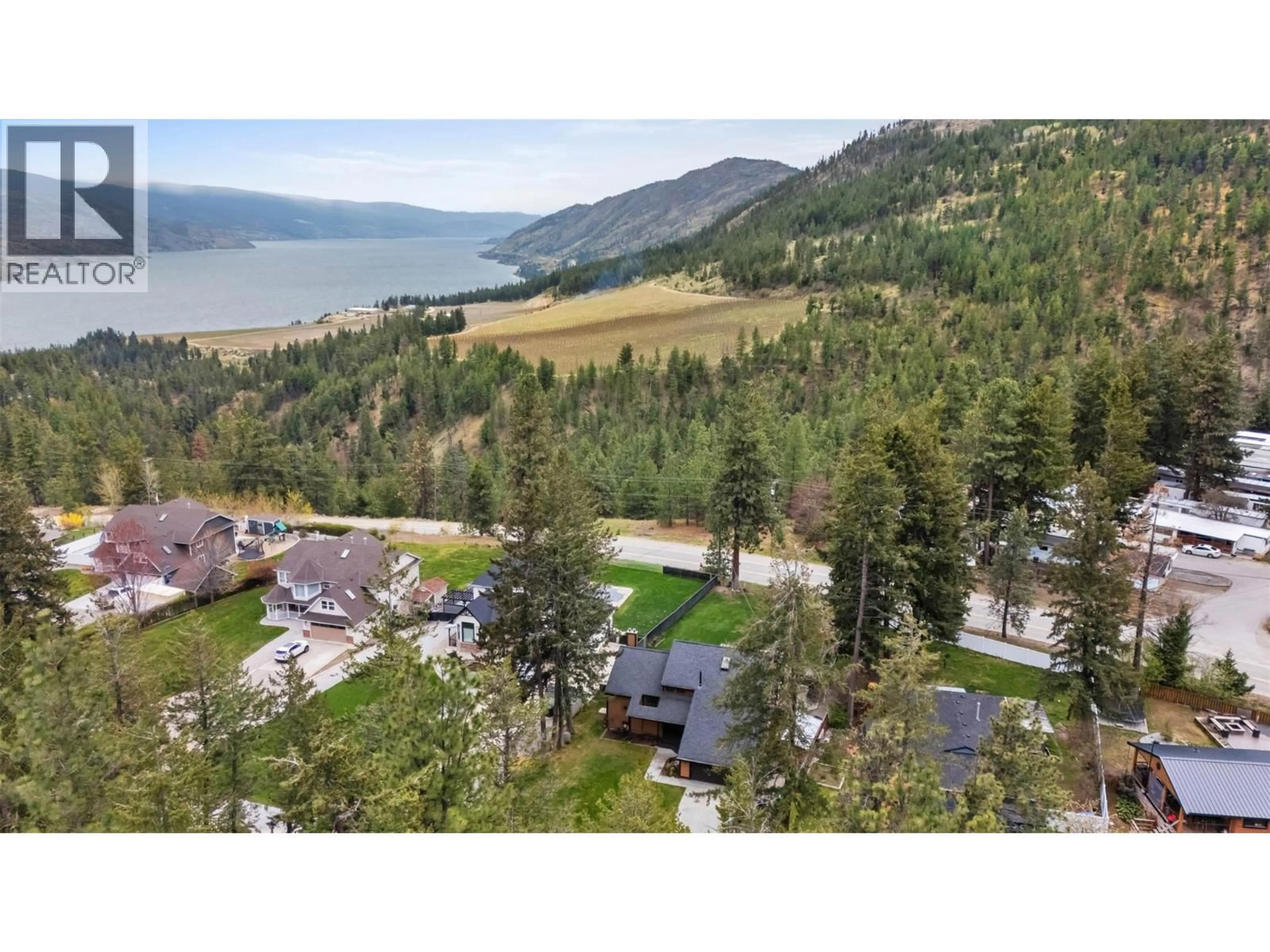 A pic from outside/outdoor area/front of a property/back of a property/a pic from drone, water/lake/river/ocean view for 5305 BRADBURY STREET, Peachland British Columbia V0H1X8