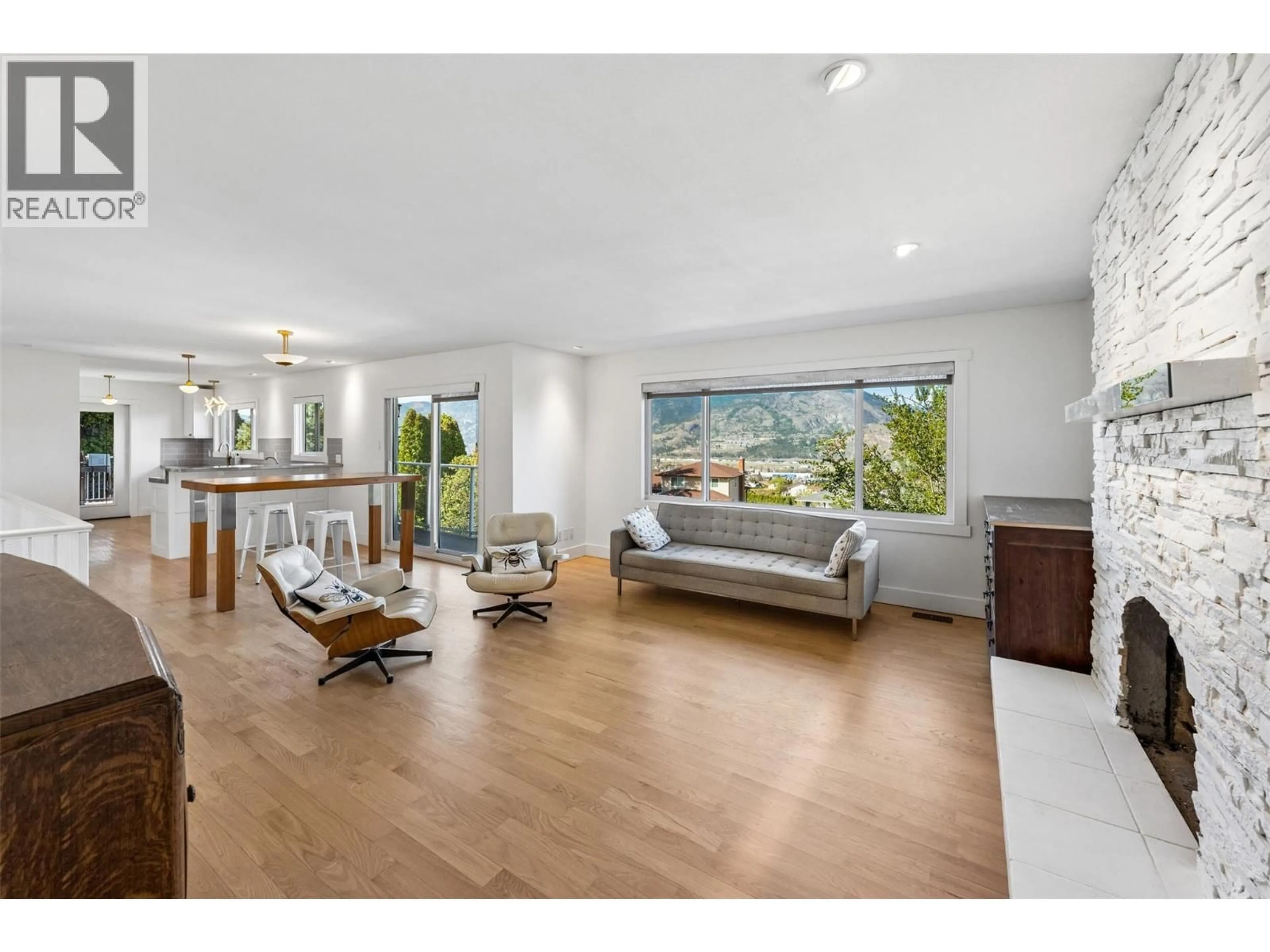 Living room with furniture, wood/laminate floor for 162 DARTMOUTH PLACE, Penticton British Columbia V2A7S4