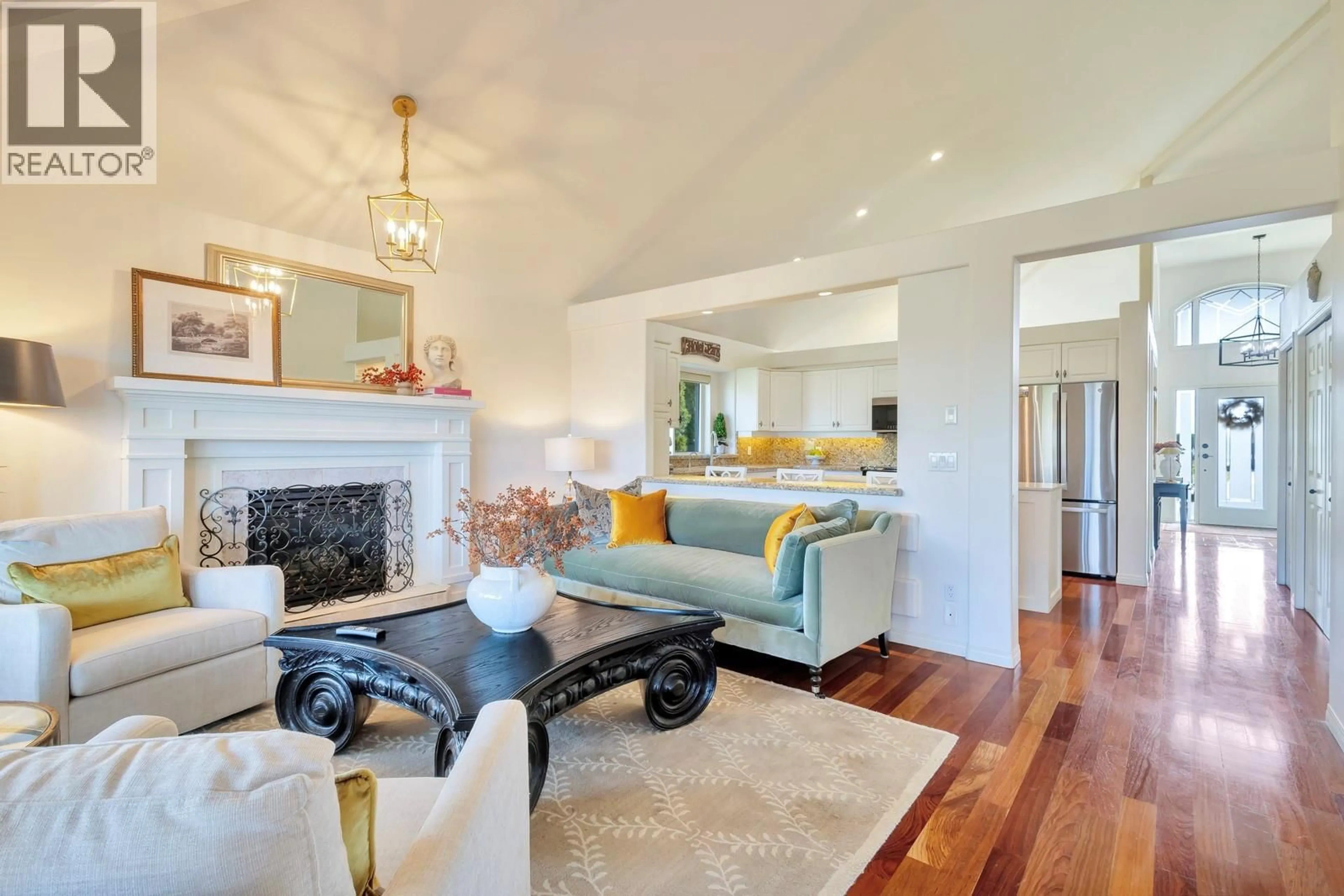 Living room with furniture, wood/laminate floor for 3482 RIDGE BOULEVARD, West Kelowna British Columbia V4T2V5