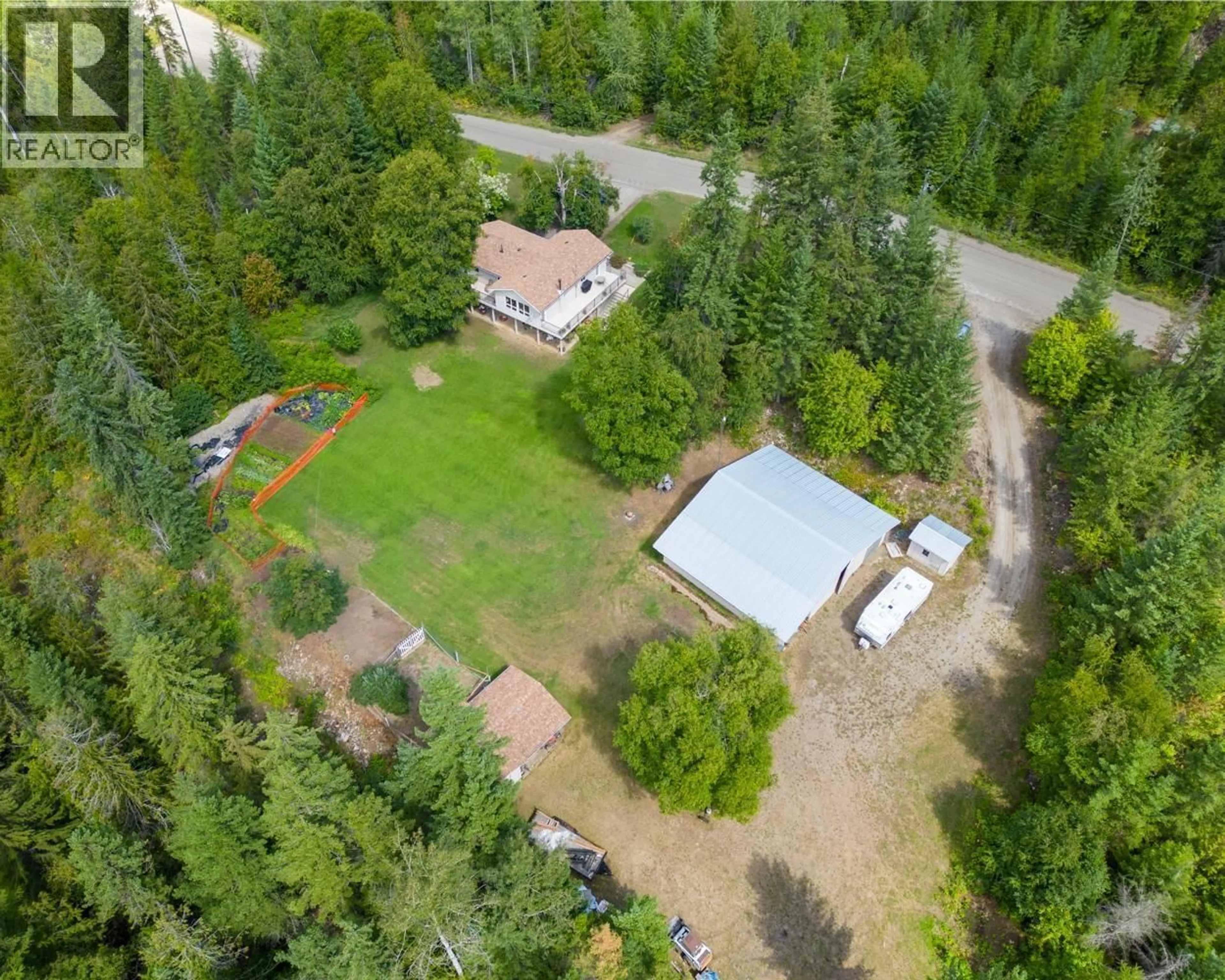 A pic from outside/outdoor area/front of a property/back of a property/a pic from drone, forest/trees view for 467 MEADOW CREEK ROAD, Meadow Creek British Columbia V0G1N0