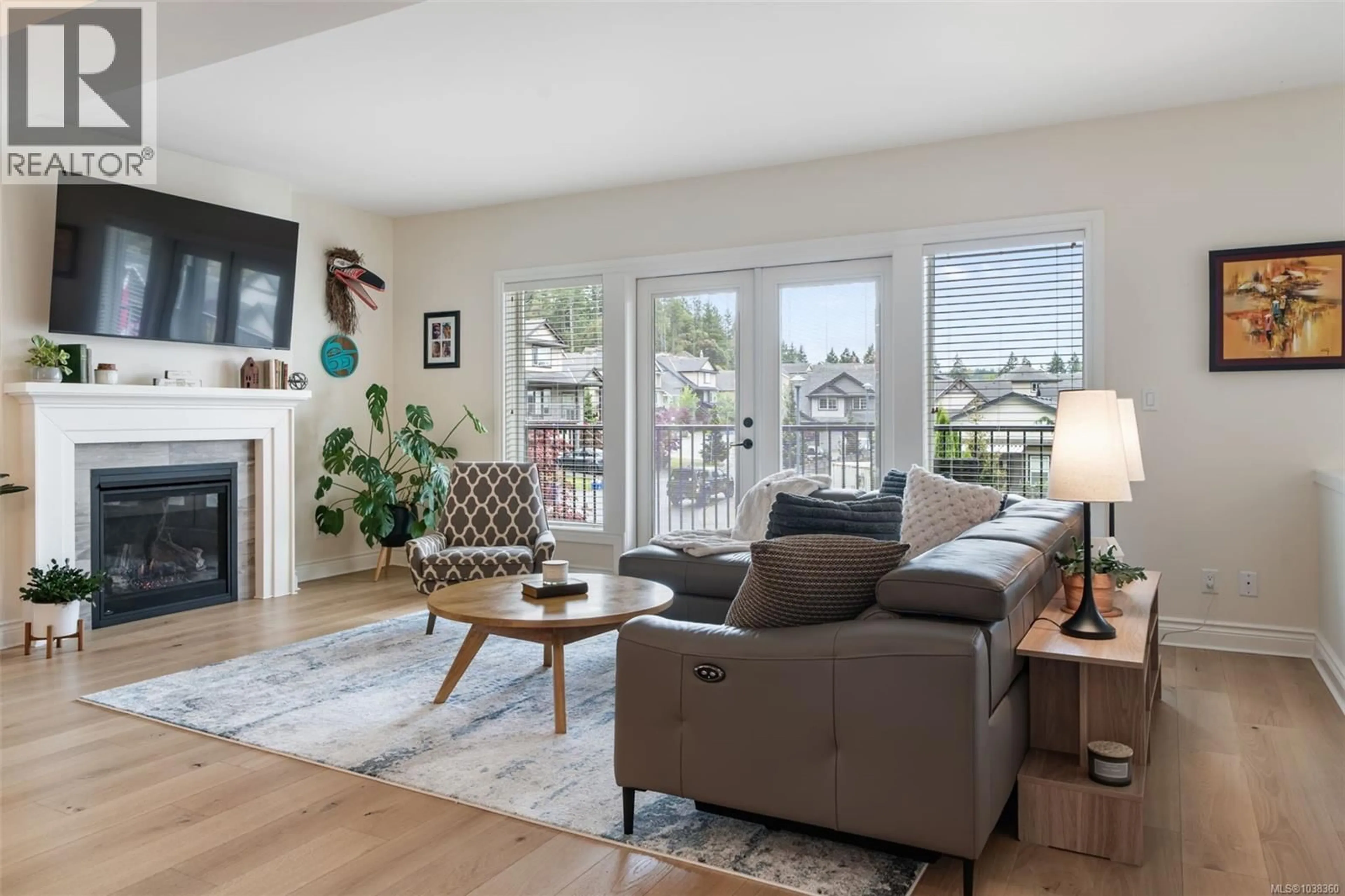 Living room with furniture, wood/laminate floor for 3479 AMBROSIA CRESCENT, Langford British Columbia V9C0K4
