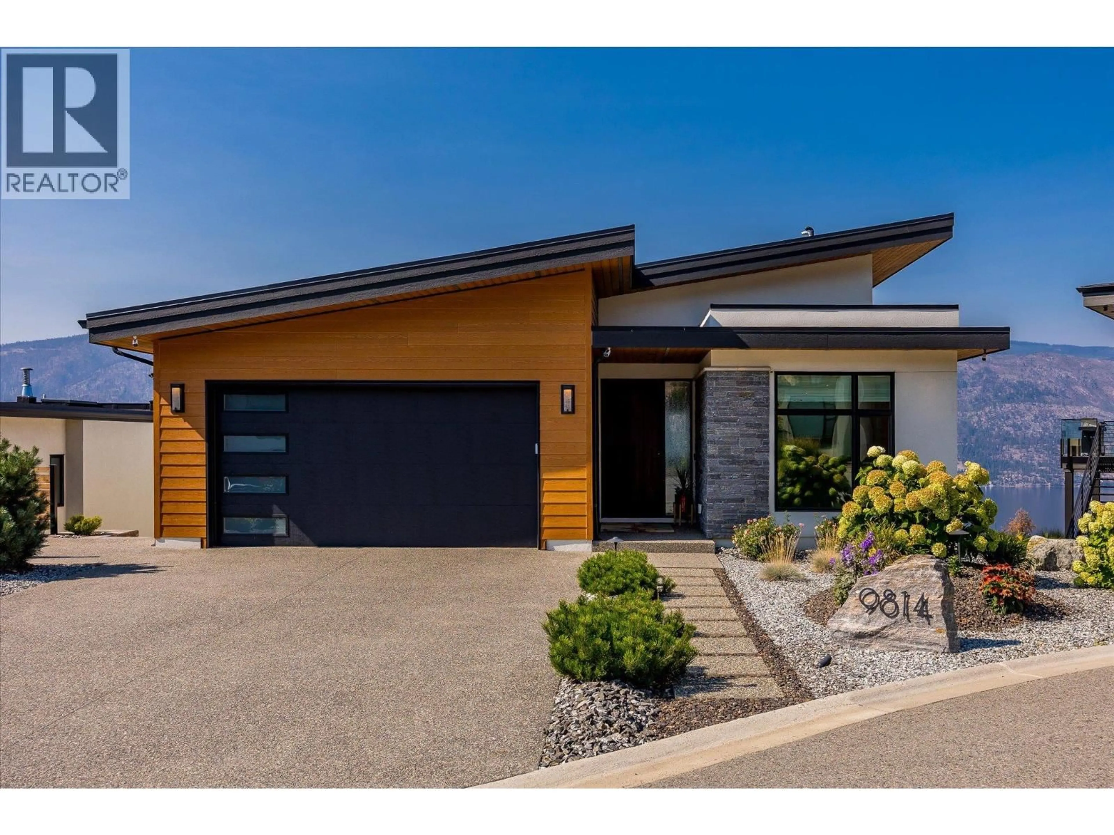 Home with brick exterior material, street for 9814 BEACON HILL CRESCENT, Lake Country British Columbia V4V0A9