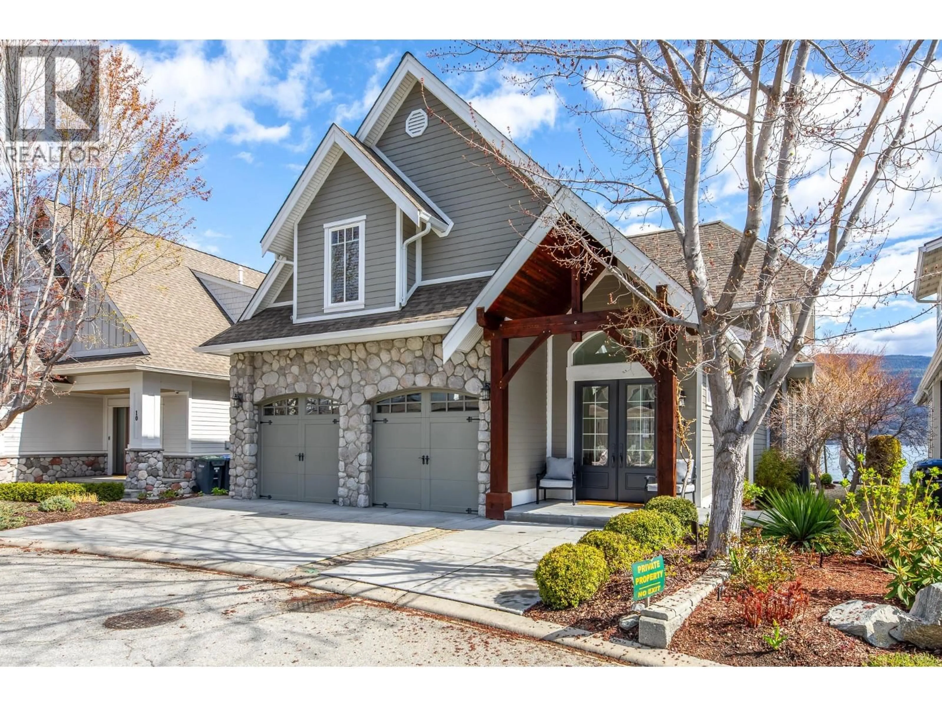 Home with brick exterior material, street for 11 - 15419 LAKESHORE DRIVE NORTH, Summerland British Columbia V0H1Z6