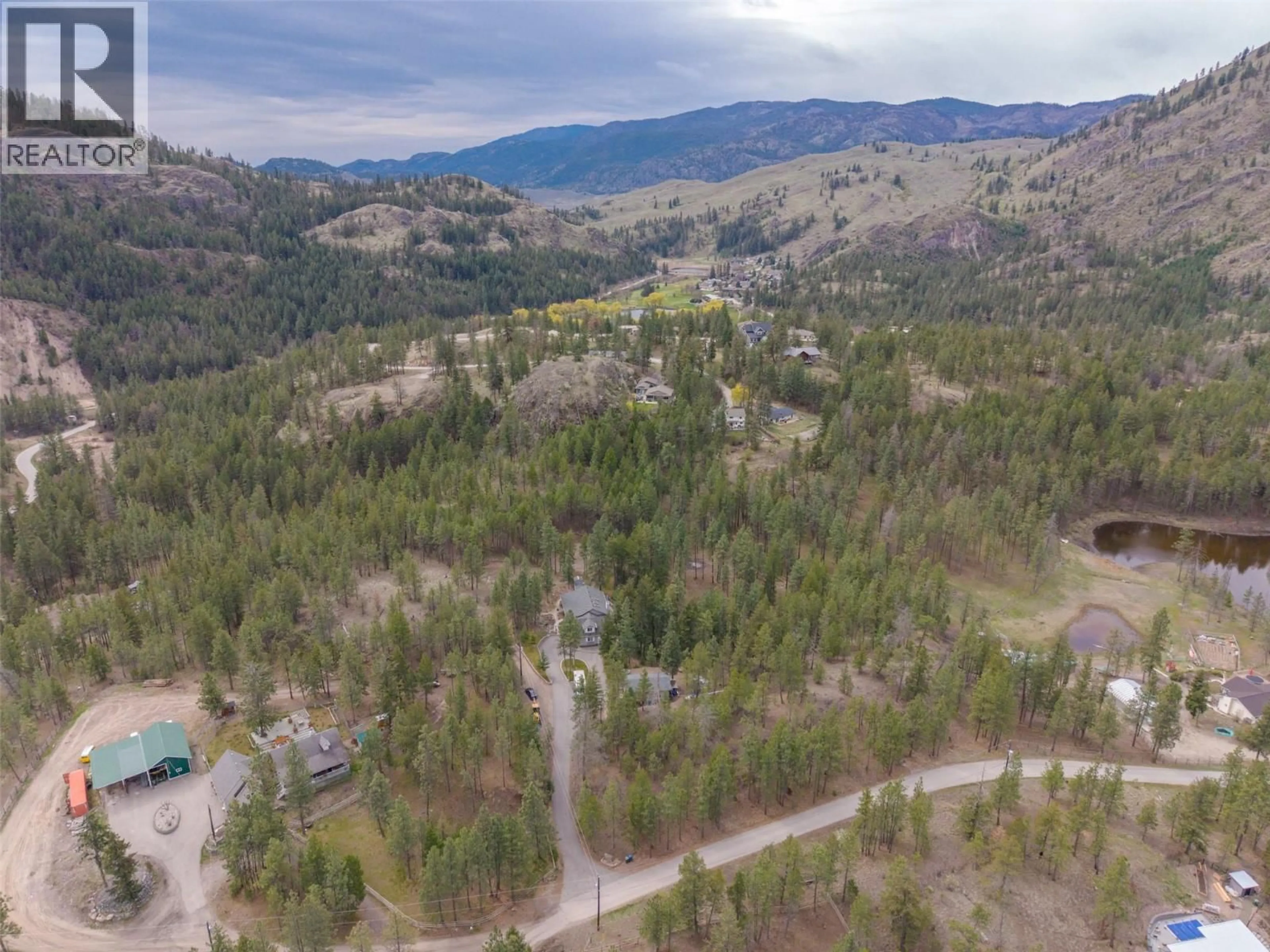 A pic from outside/outdoor area/front of a property/back of a property/a pic from drone, mountain view for 143 SADDLEHORN DRIVE, Kaleden British Columbia V0H1K0