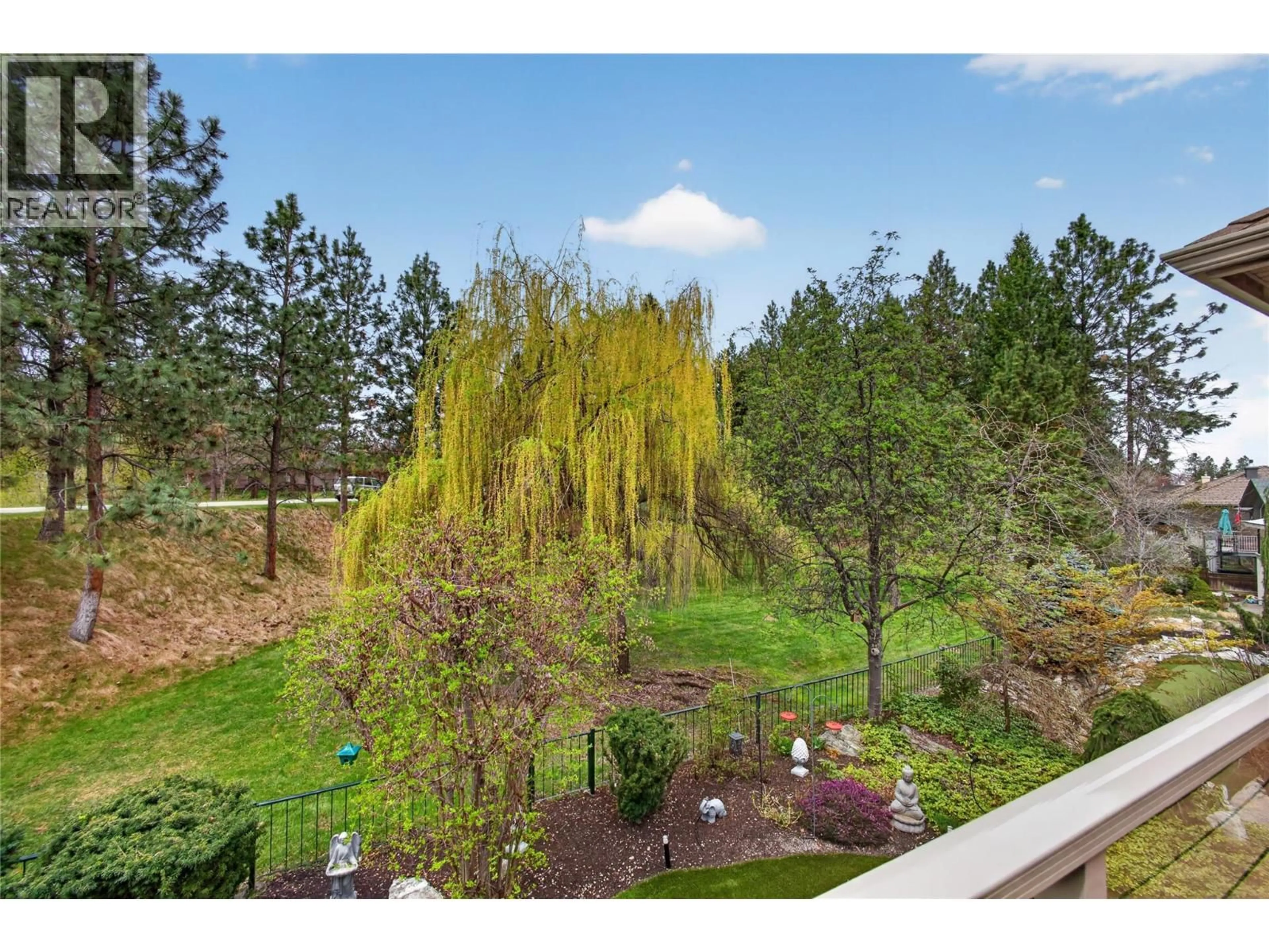 A pic from outside/outdoor area/front of a property/back of a property/a pic from drone, forest/trees view for 4178 GALLAGHERS BOULEVARD SOUTH, Kelowna British Columbia V1W4X2