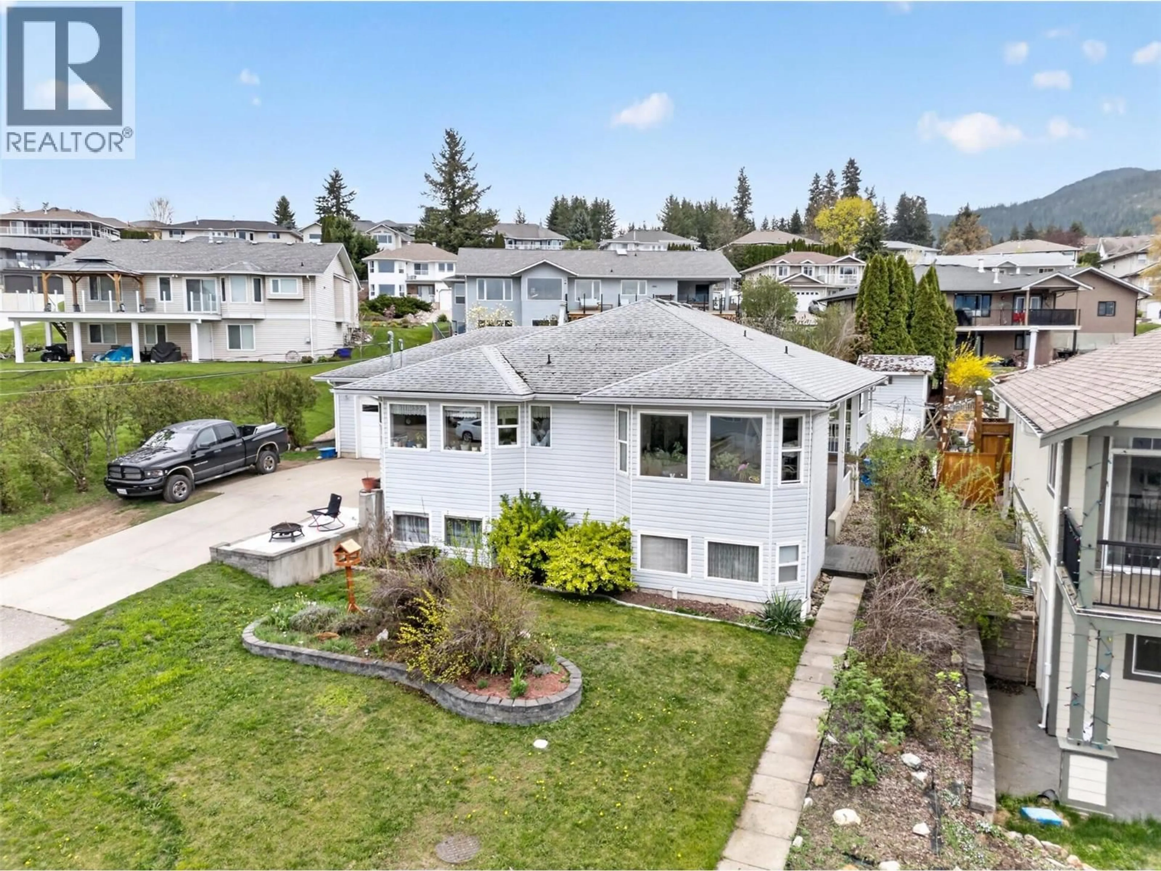 A pic from outside/outdoor area/front of a property/back of a property/a pic from drone, street for 2190 1ST AVENUE SOUTHEAST, Salmon Arm British Columbia V1E1K1