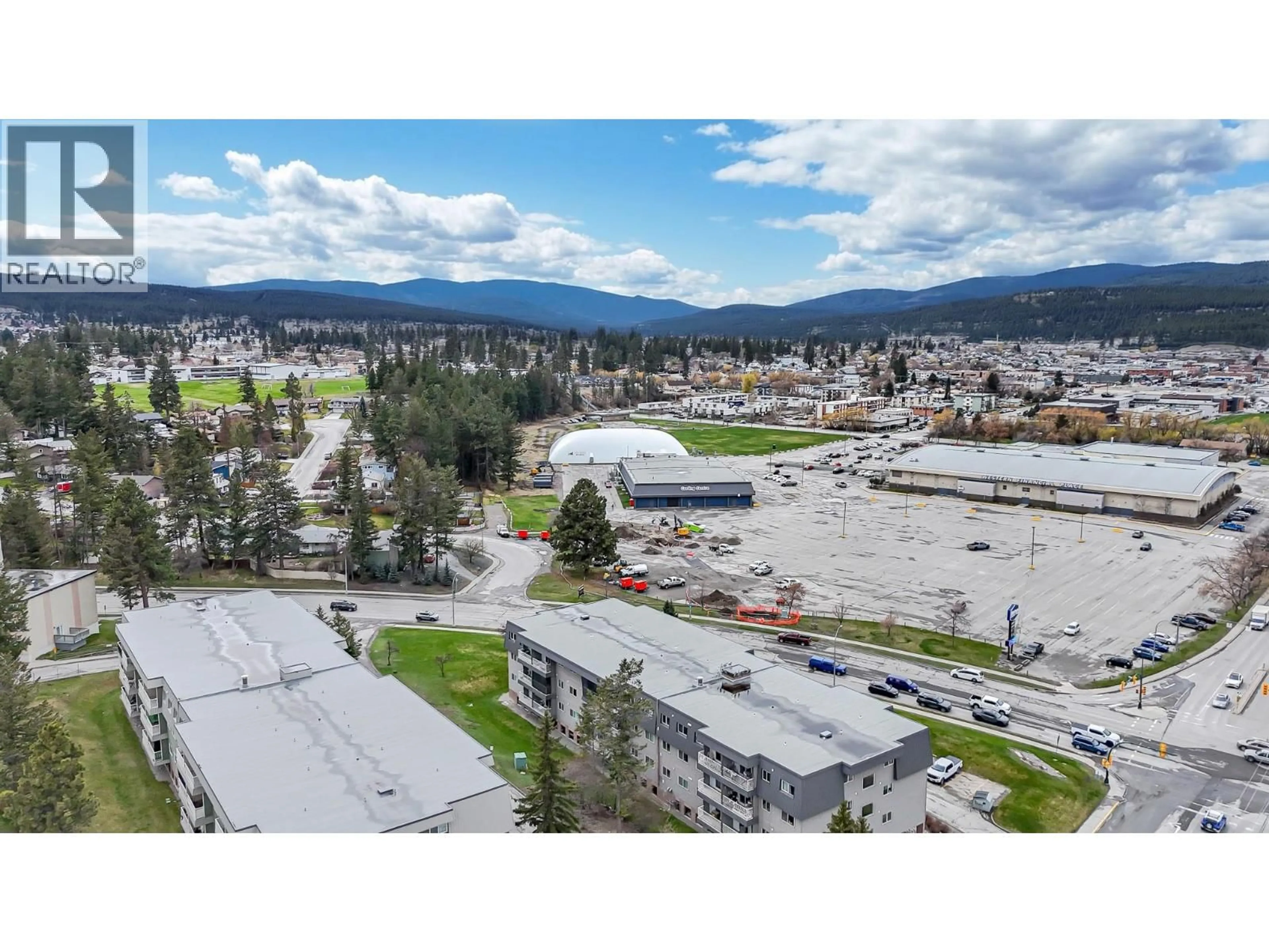 A pic from outside/outdoor area/front of a property/back of a property/a pic from drone, mountain view for 1416 - 2015 2 STREET NORTH, Cranbrook British Columbia V1C3L4