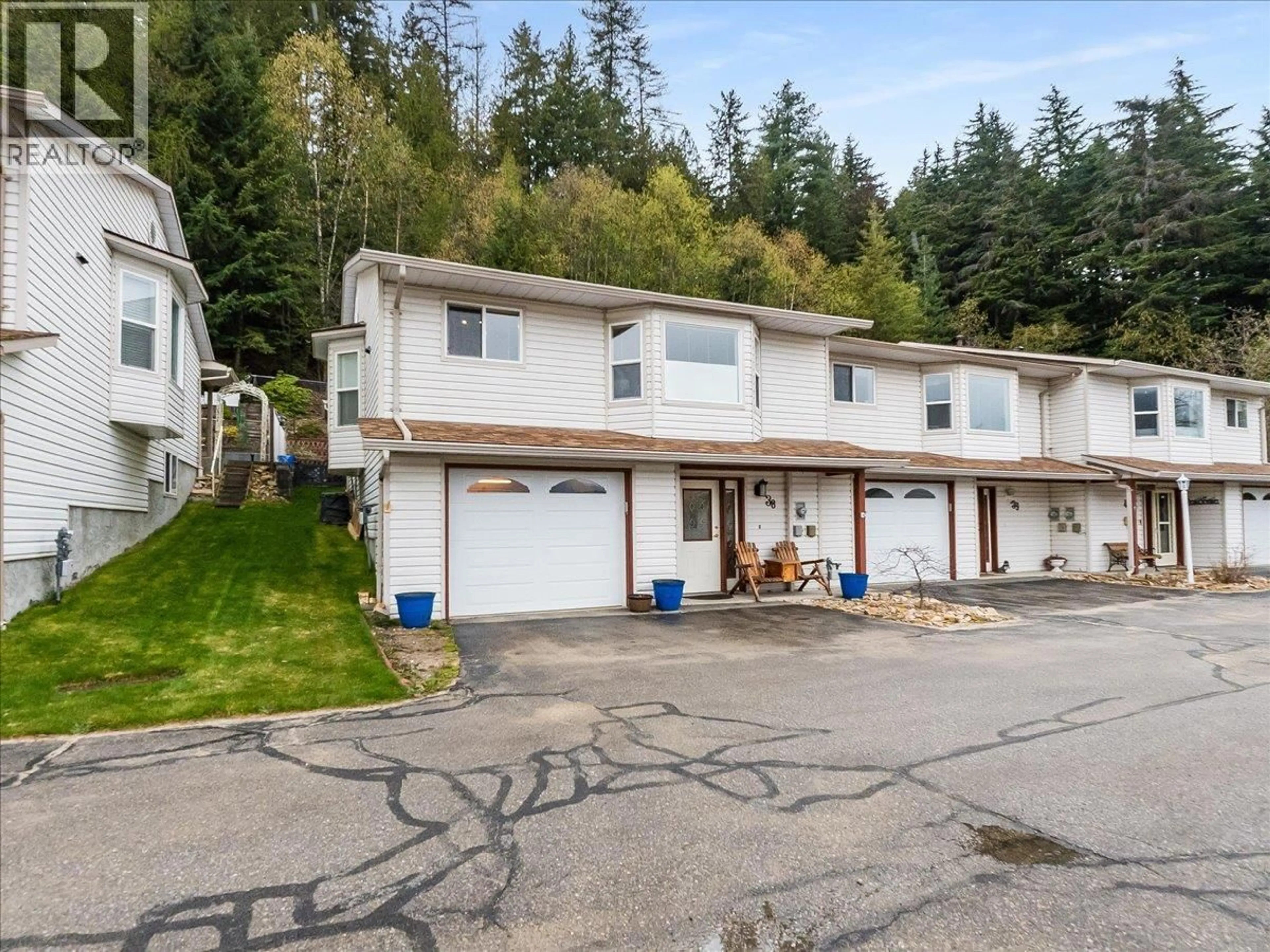 A pic from outside/outdoor area/front of a property/back of a property/a pic from drone, street for 38 - 2210 COLUMBIA AVENUE, Castlegar British Columbia V1N2X1