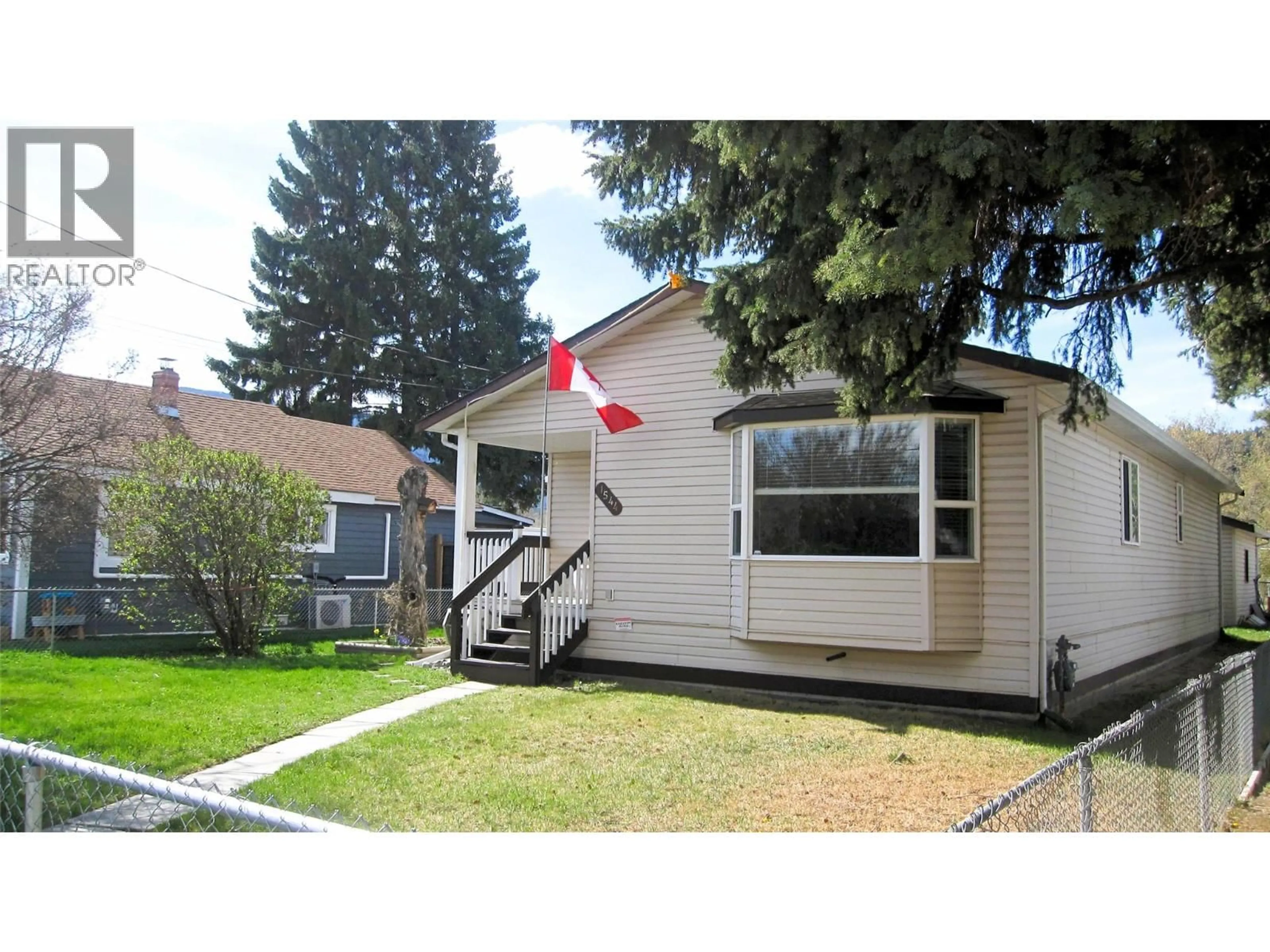 Home with vinyl exterior material, street for 1544 CANFORD AVENUE, Merritt British Columbia V1K1B8