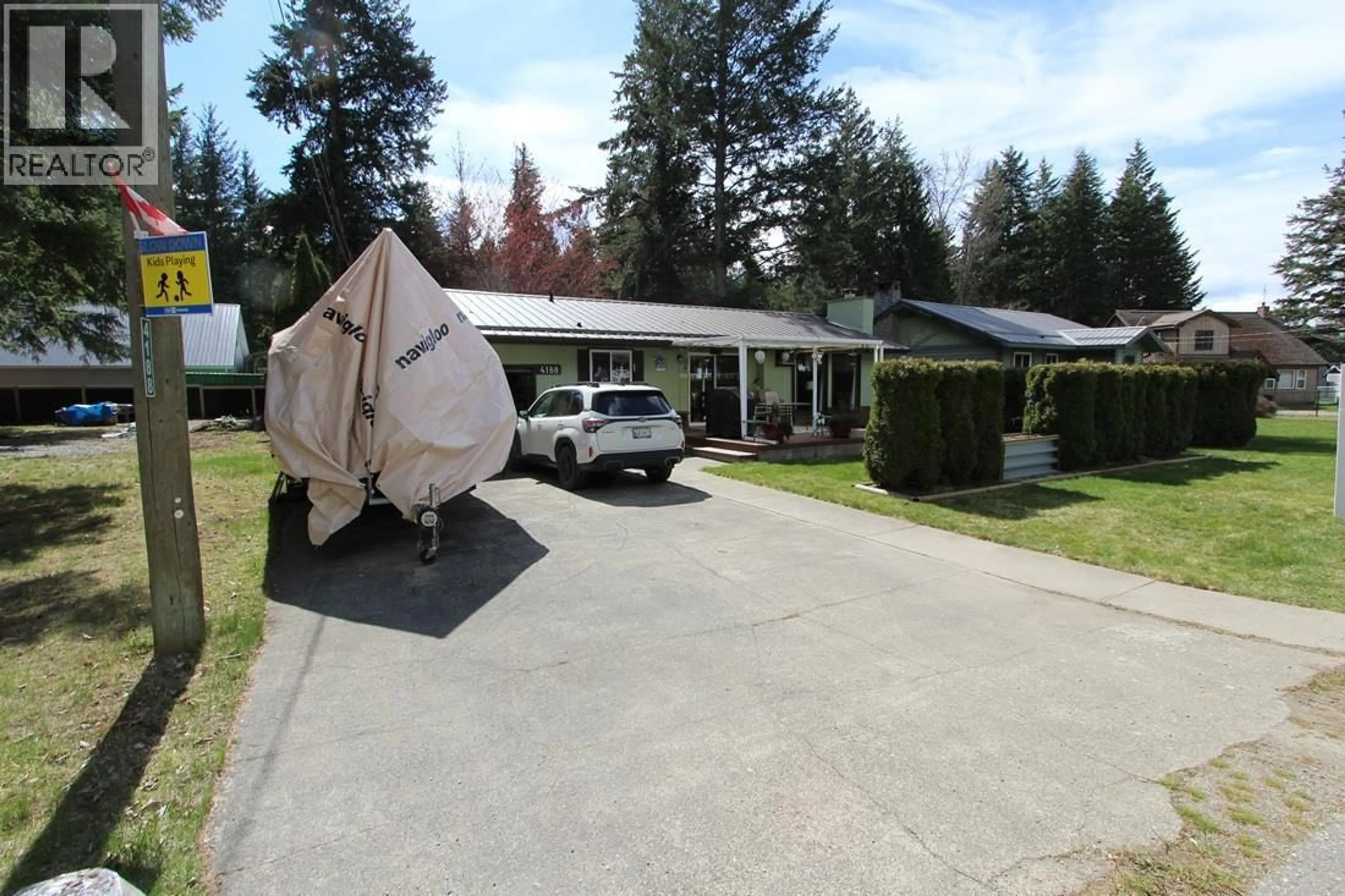 Home with vinyl exterior material, street for 4188 SOUTH ASHE CRESCENT, Scotch Creek British Columbia V0E1M5