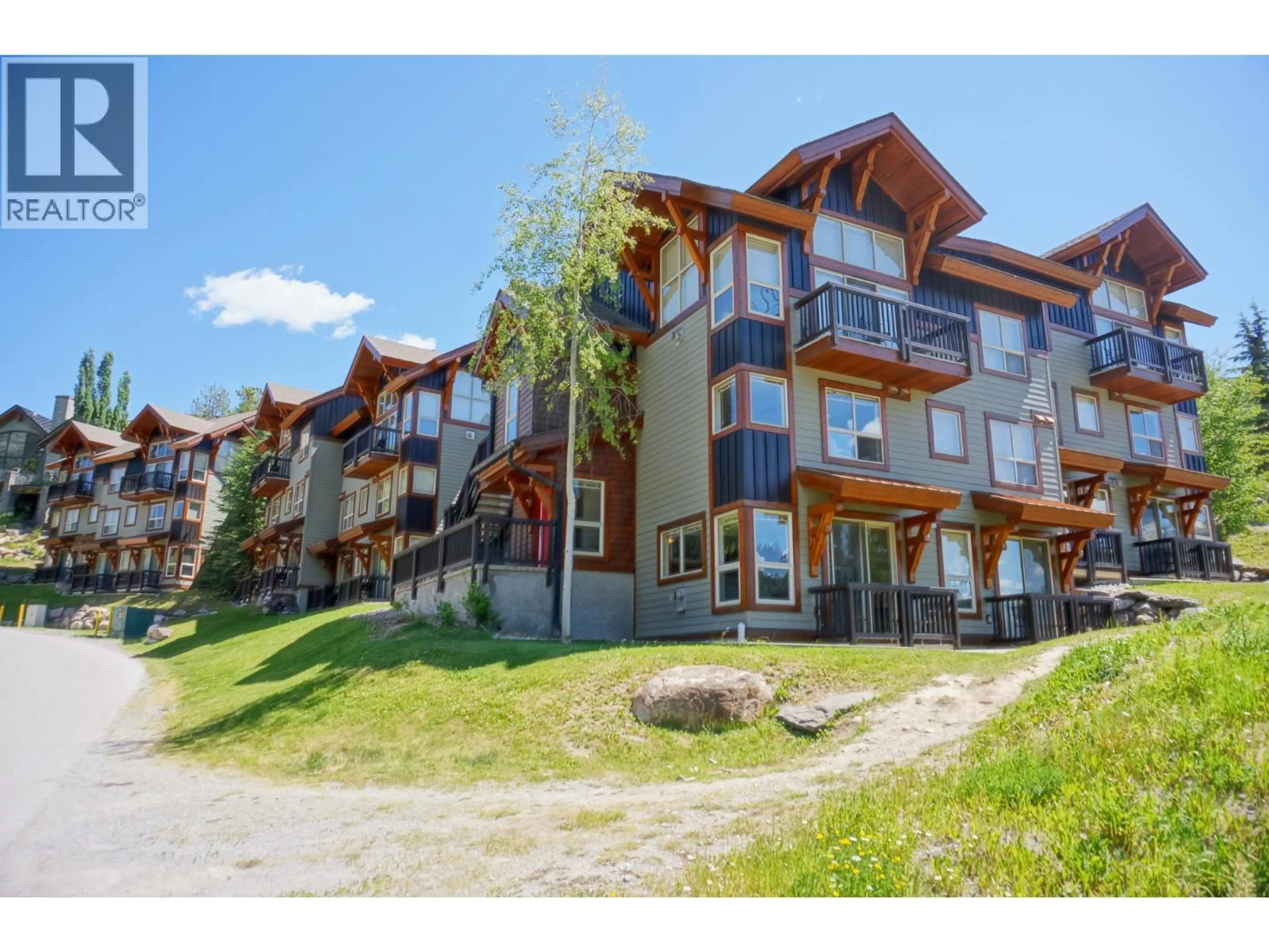 A pic from outside/outdoor area/front of a property/back of a property/a pic from drone, mountain view for 314B - 2049 SUMMIT DRIVE, Panorama British Columbia V0A1T0