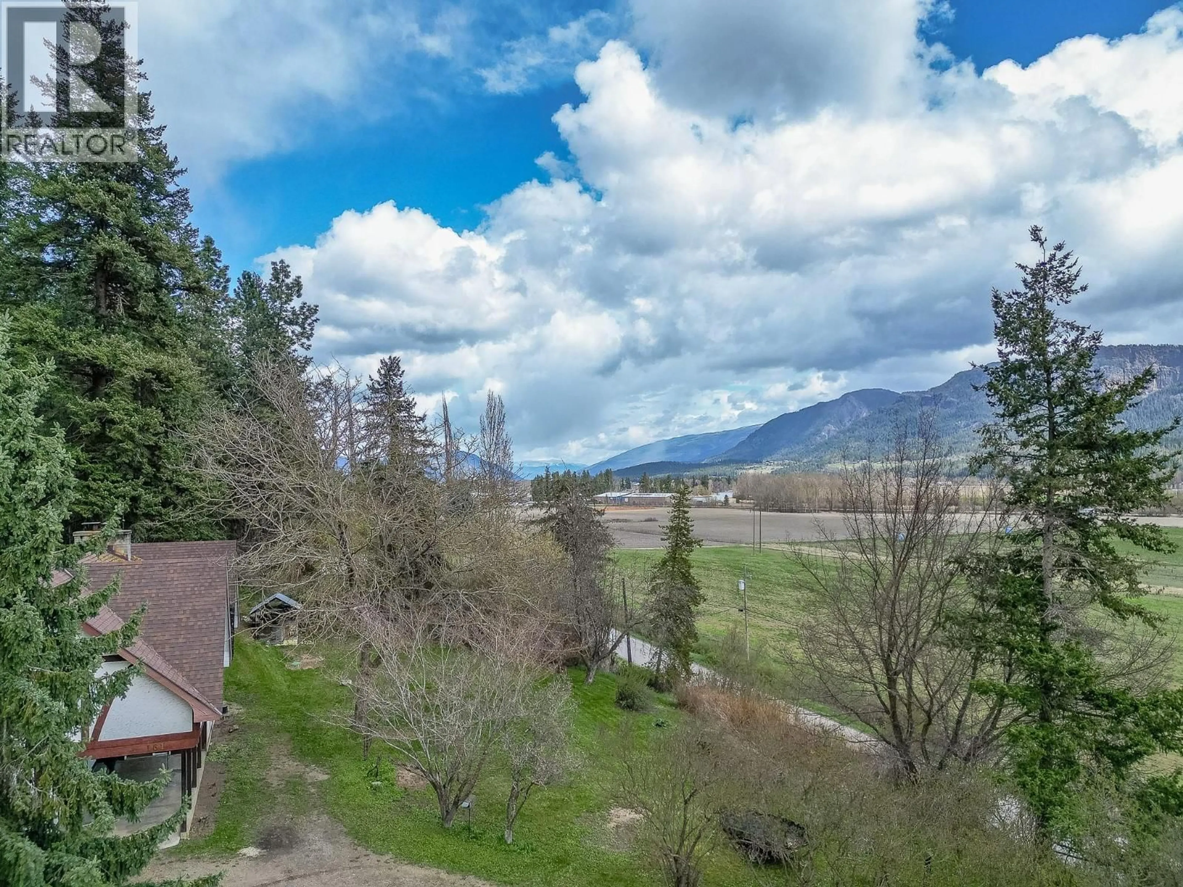 A pic from outside/outdoor area/front of a property/back of a property/a pic from drone, mountain view for 161 OLD SALMON ARM ROAD, Enderby British Columbia V0E1V1