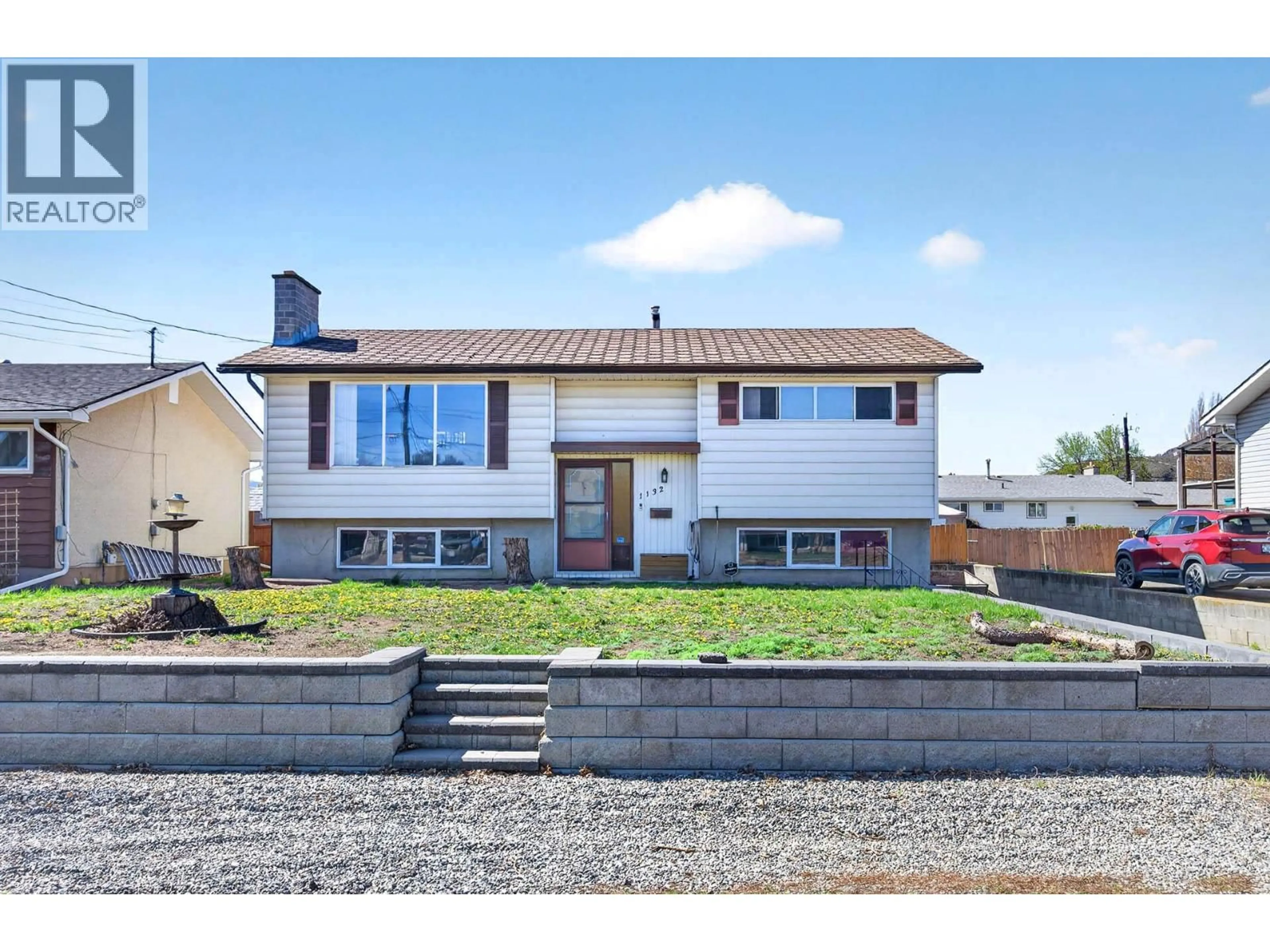 Home with vinyl exterior material, street for 1132 WINDBREAK STREET, Kamloops British Columbia V2B5R2