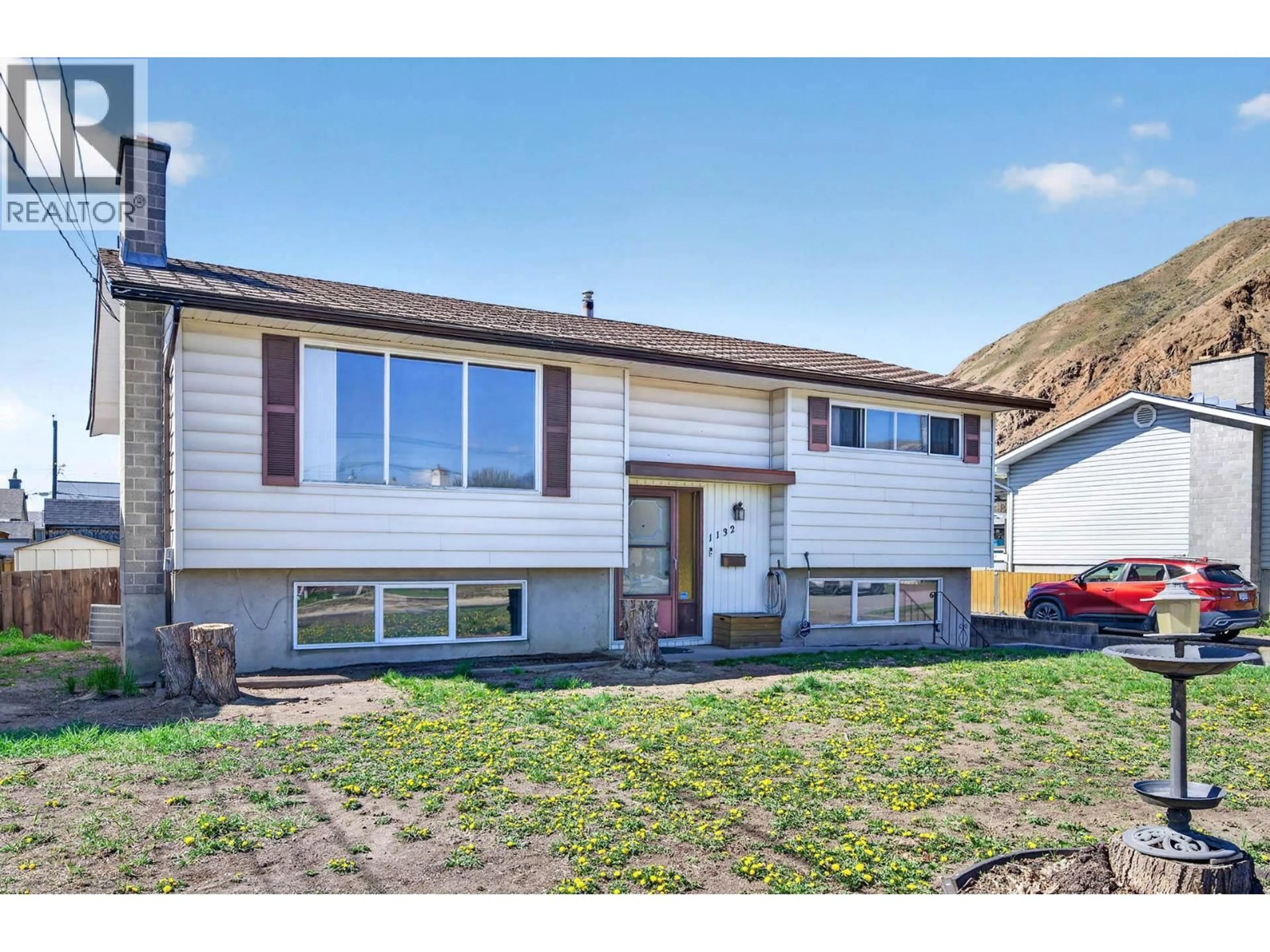 Home with vinyl exterior material, street for 1132 WINDBREAK STREET, Kamloops British Columbia V2B5R2