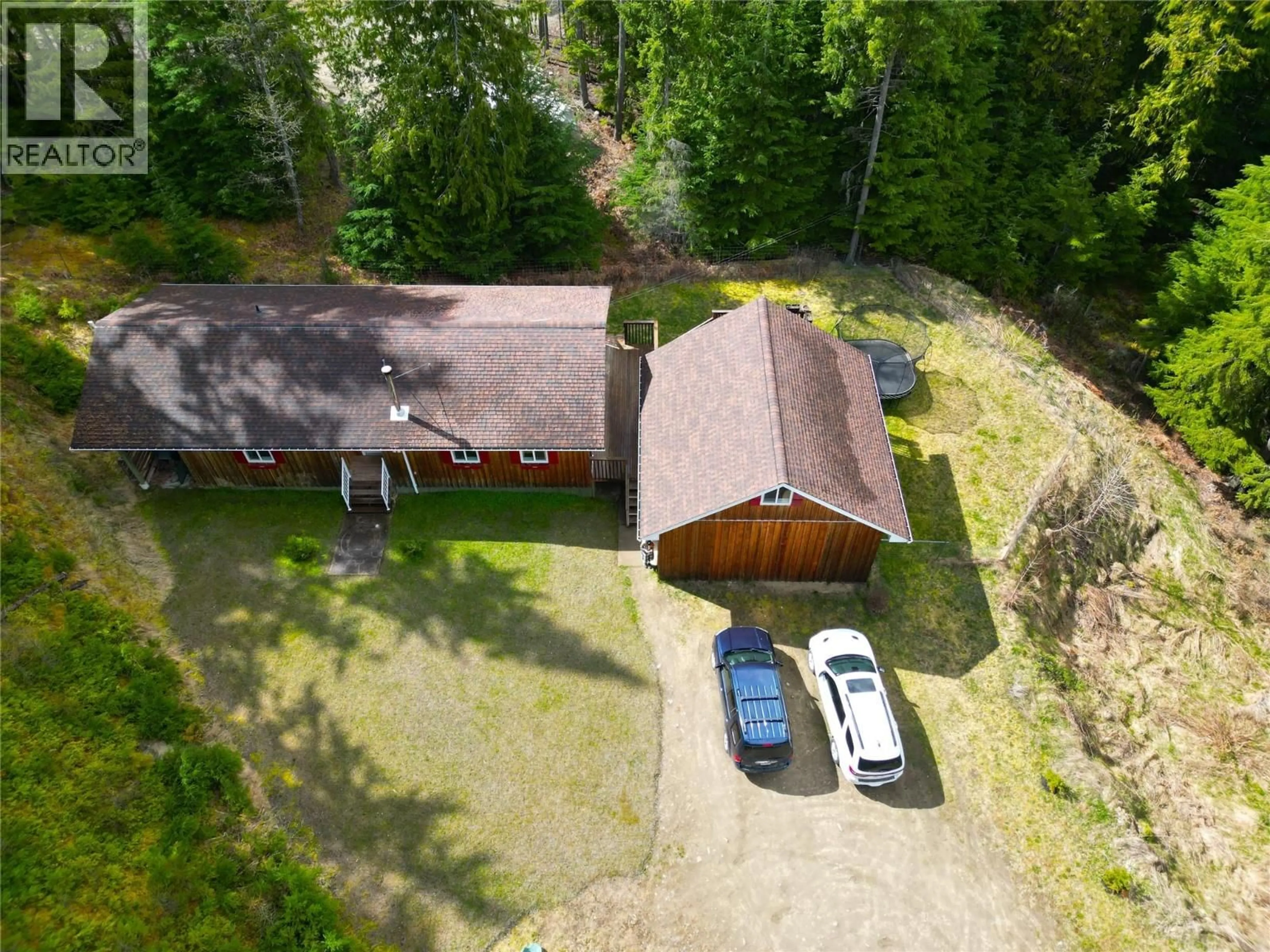 A pic from outside/outdoor area/front of a property/back of a property/a pic from drone, forest/trees view for 245 ALEXANDER ROAD ROAD, Procter British Columbia V1L0B5