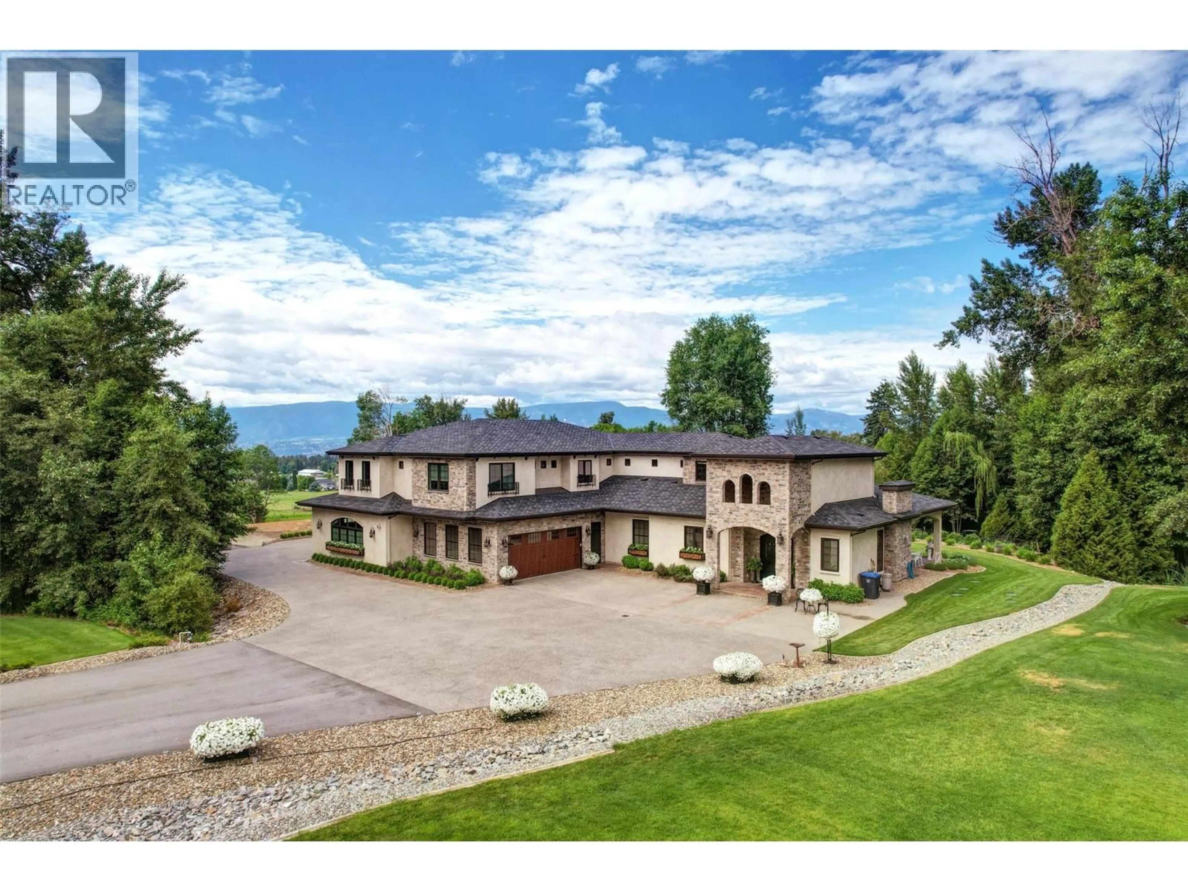 A pic from outside/outdoor area/front of a property/back of a property/a pic from drone, mountain view for 2950 BALLDOCK ROAD, Kelowna British Columbia V1W4C3