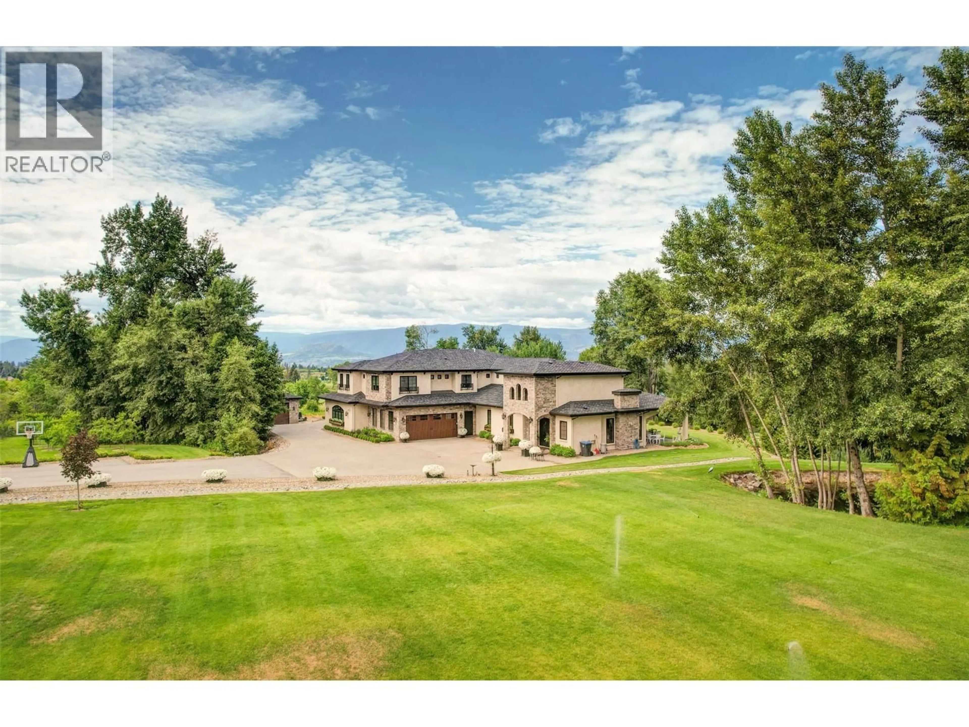 A pic from outside/outdoor area/front of a property/back of a property/a pic from drone, mountain view for 2950 BALLDOCK ROAD, Kelowna British Columbia V1W4C3