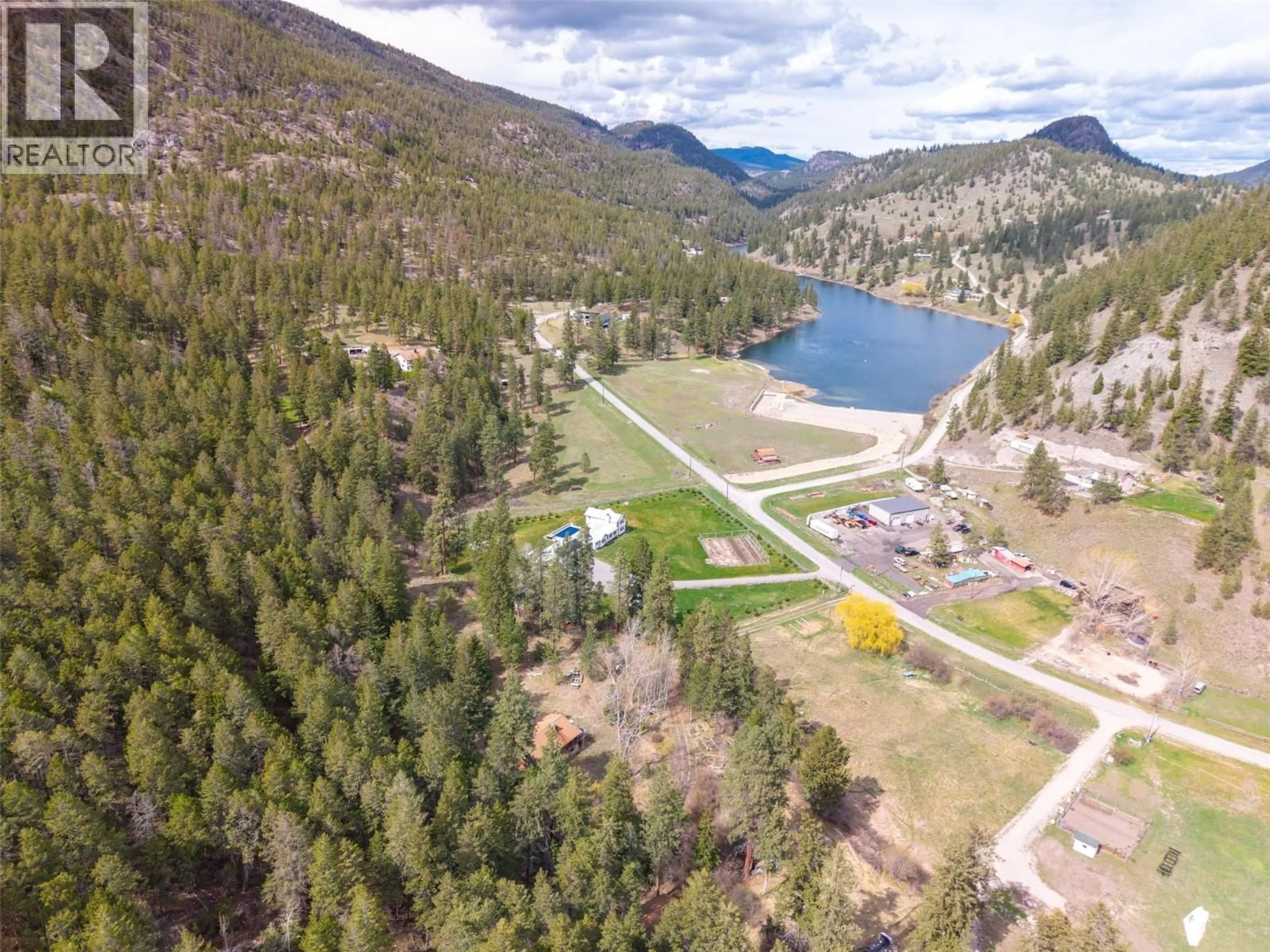 A pic from outside/outdoor area/front of a property/back of a property/a pic from drone, water/lake/river/ocean view for 128 FARLEIGH LAKE ROAD, Penticton British Columbia V2A0E6
